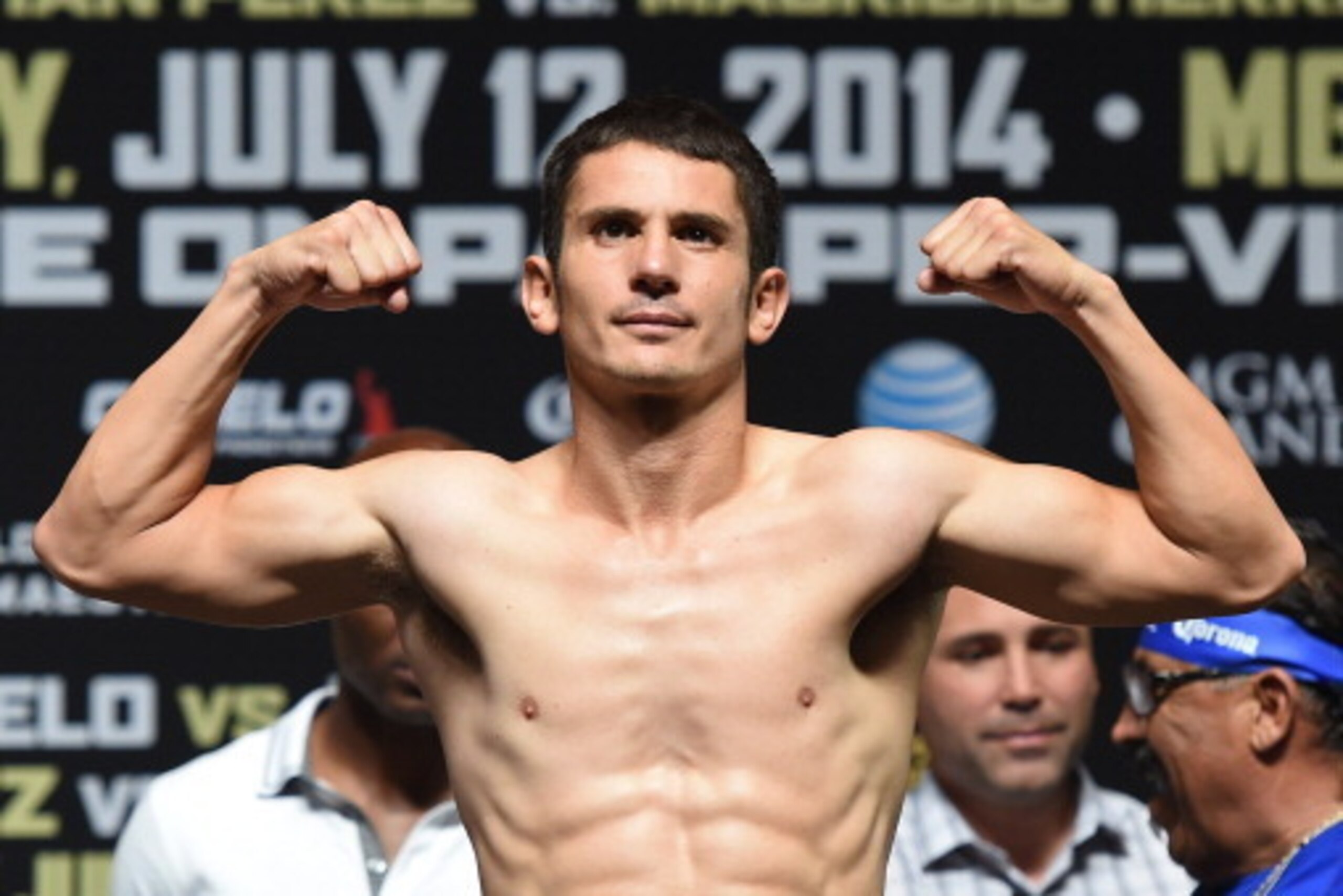 LAS VEGAS, NV - JULY 11:  Boxer Mauricio Herrera poses on the scale during his official weigh-in at the MGM Grand Garden Arena on July 11, 2014 in Las Vegas, Nevada. Herrera will challenge interim WBA junior welterweight champion Johan Perez for his title