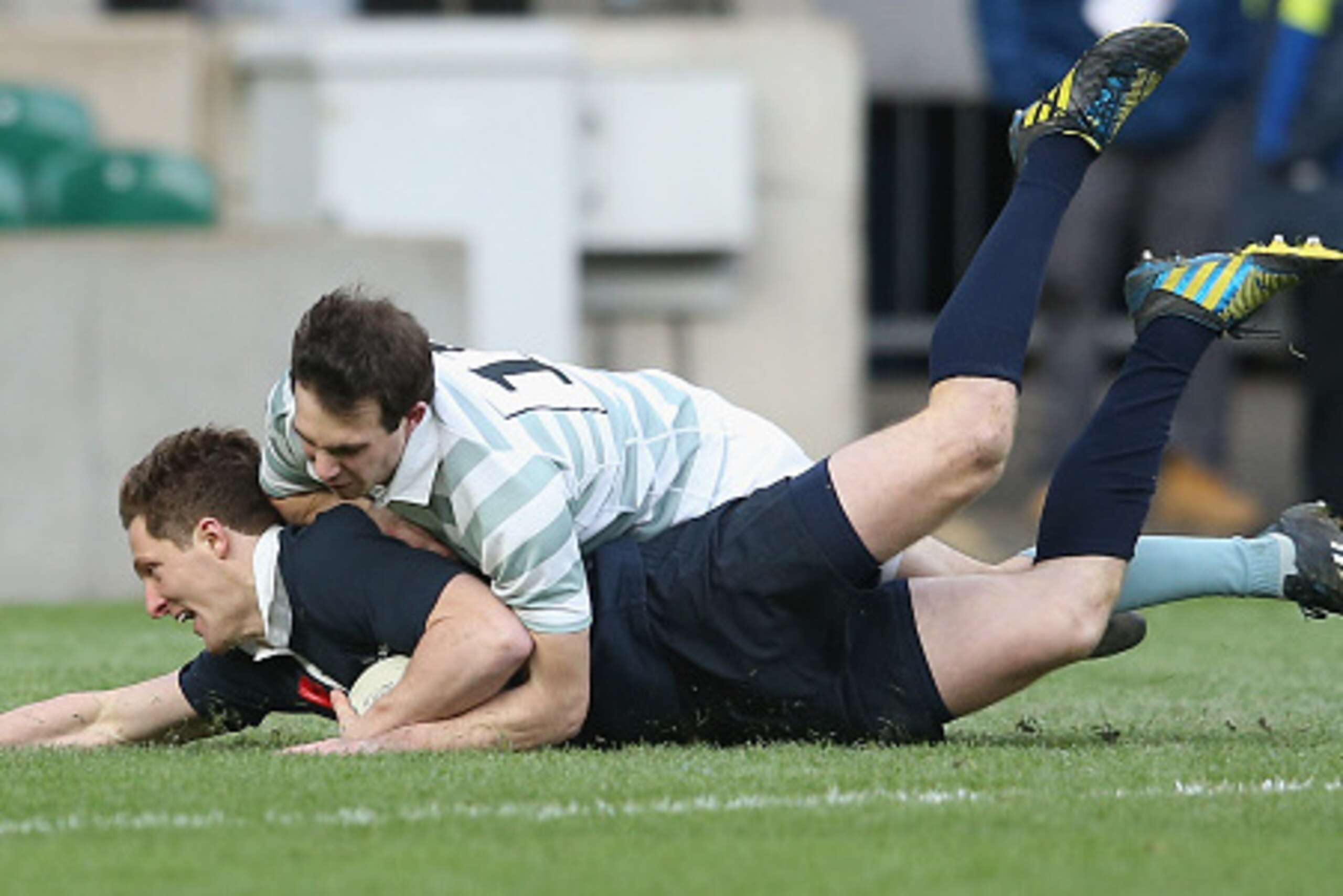 LONDON, ENGLAND - DECEMBER 11:  Sam Egerton of Oxford dives over for the first try during the Varsity match between Oxford University and Cambridge University at Twickenham Stadium on December 11, 2014 in London, England.  (Photo by David Rogers/Getty Ima