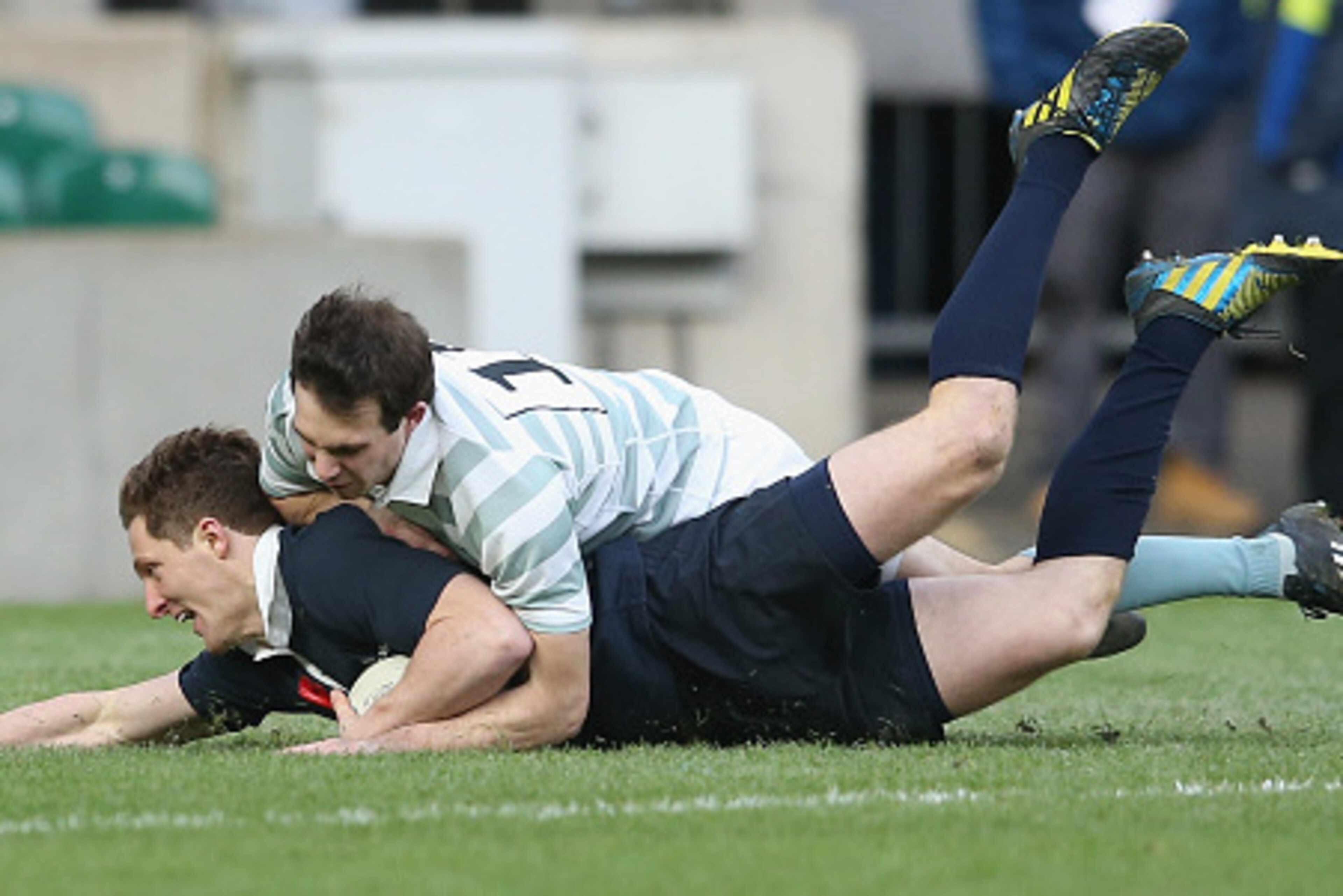 LONDON, ENGLAND - DECEMBER 11:  Sam Egerton of Oxford dives over for the first try during the Varsity match between Oxford University and Cambridge University at Twickenham Stadium on December 11, 2014 in London, England.  (Photo by David Rogers/Getty Ima