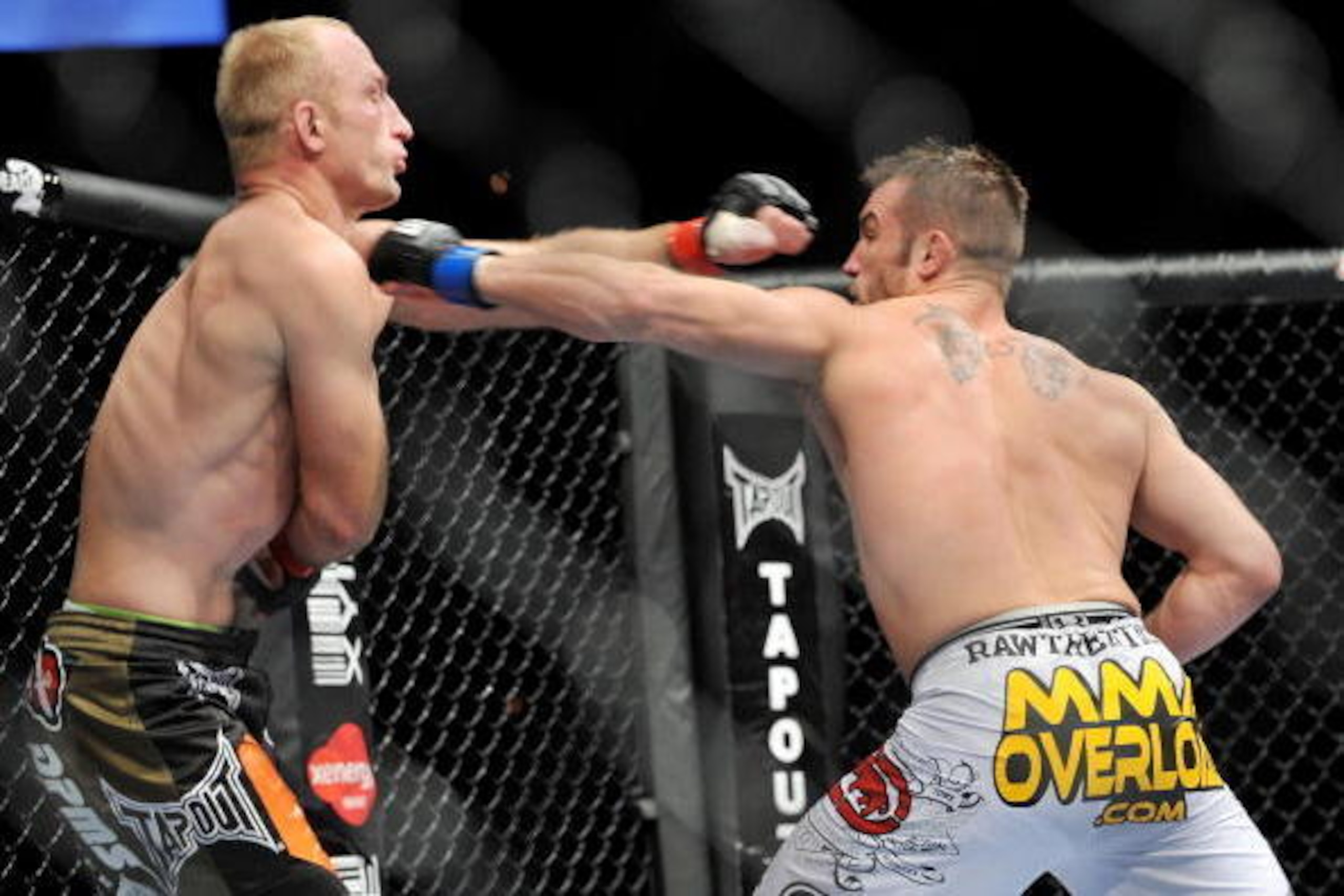 LAS VEGAS - NOVEMBER 21: Brock Larson (L) battles Brian Foster (R) during their Welterweight Fight at the UFC 106 at Mandalay Bay Events Center on November 21, 2009 in Las Vegas, Nevada. (Photo by Jon Kopaloff/Getty Images)