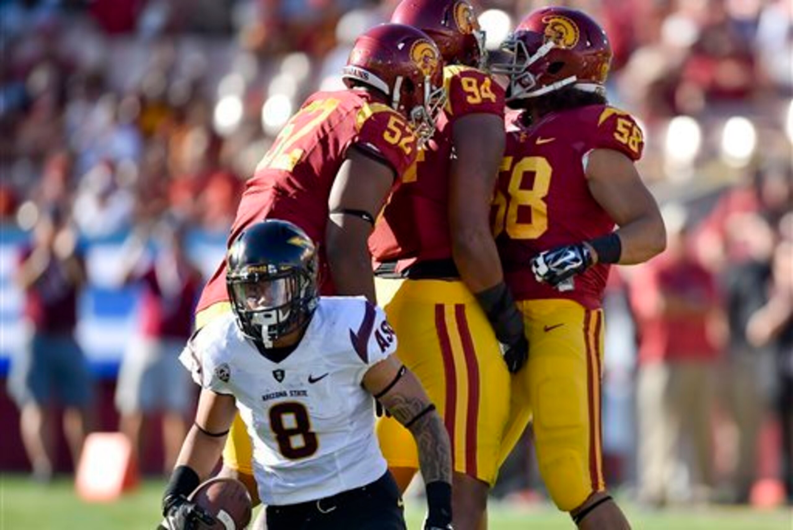 The USC defensive front seven sold out on Arizona State D.J. Foster (No. 8), holding him to 13 yards rushing on Oct. 4.