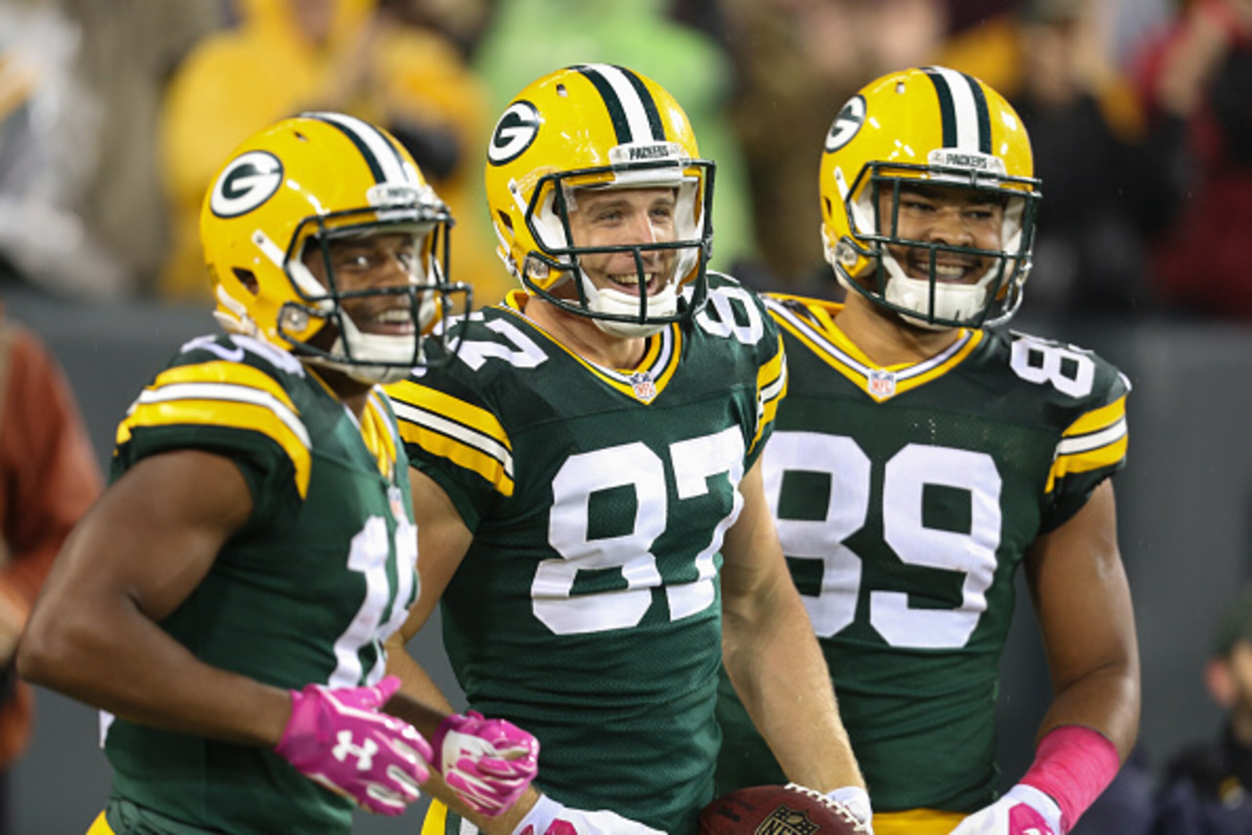 GREEN BAY, WI - OCTOBER 2:  Jordy Nelson #87 of the Green Bay Packers celebrates with Randall Cobb #18 and Richard Rodgers #89 after running the football into the end zone on a 66 yard pass, to score against the Minnesota Vikings in the first half of the 