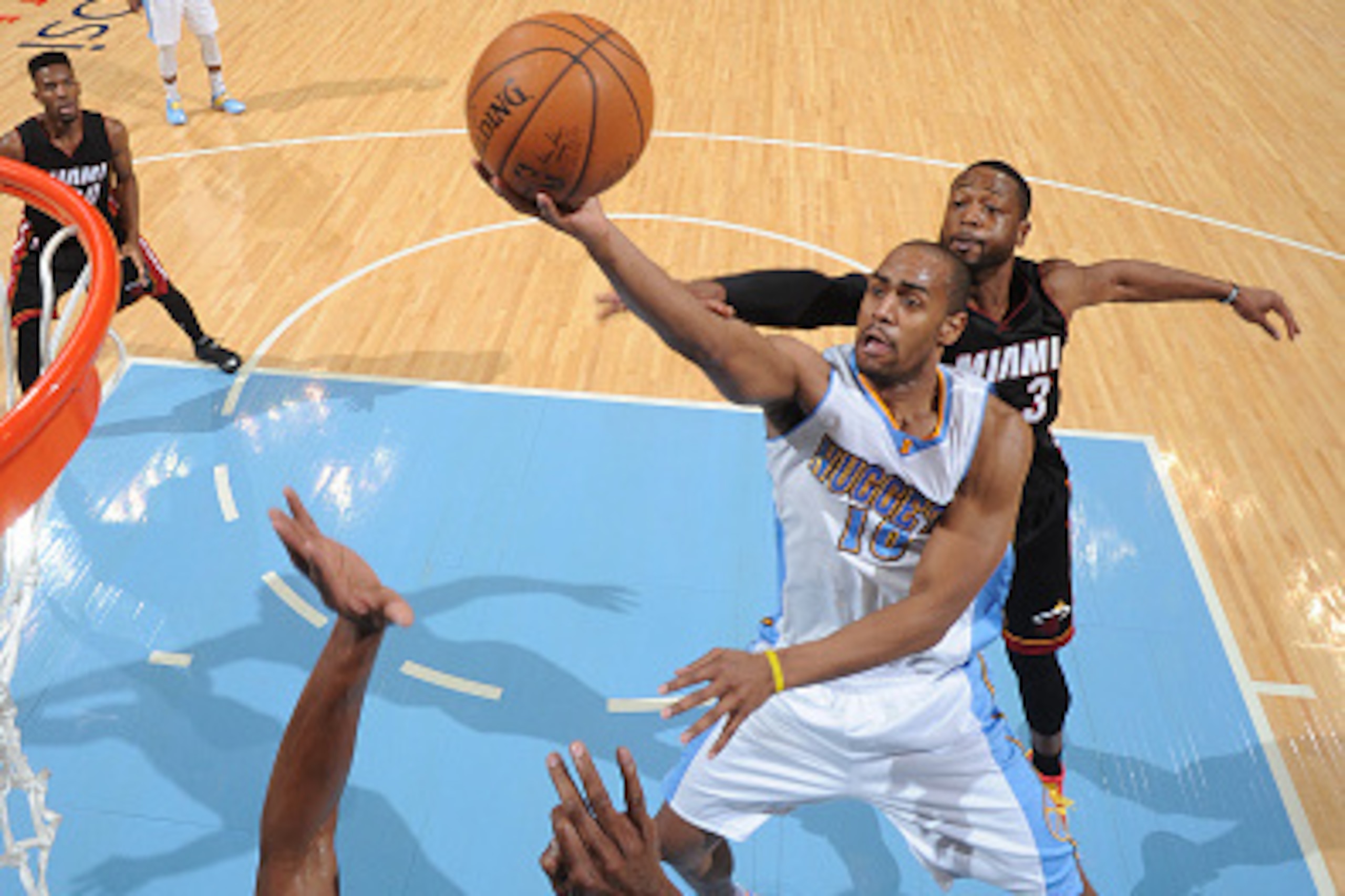 DENVER, CO - DECEMBER 10:  Arron Afflalo #10 of the Denver Nuggets shoots the ball against the Miami Heat during the game on December 10, 2014 at the Pepsi Center in Denver, Colorado. NOTE TO USER: User expressly acknowledges and agrees that, by downloadi