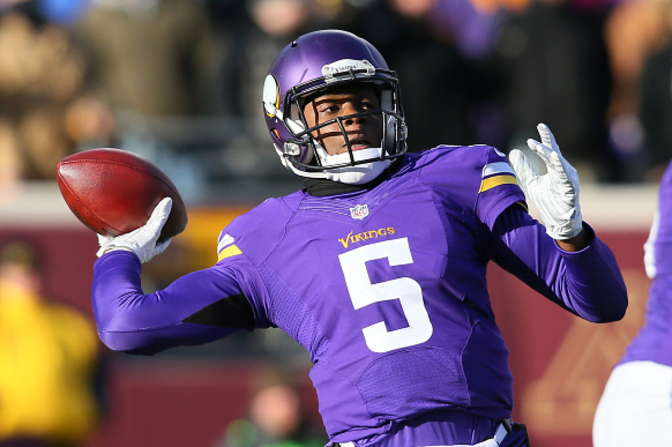 MINNEAPOLIS, MN - NOVEMBER 30: Teddy Bridgewater #5 of the Minnesota Vikings throws a pass against the Carolina Panthers in the fourth quarter on November 30, 2014 at TCF Bank Stadium in Minneapolis, Minnesota. (Photo by Adam Bettcher/Getty Images)