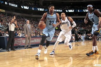 DALLAS, TX - JANUARY 12: Rudy Gay #22 of the Memphis Grizzlies drives against Shawn Marion #0 of the Dallas Mavericks on January 12, 2013 at the American Airlines Center in Dallas, Texas. NOTE TO USER: User expressly acknowledges and agrees that, by downl