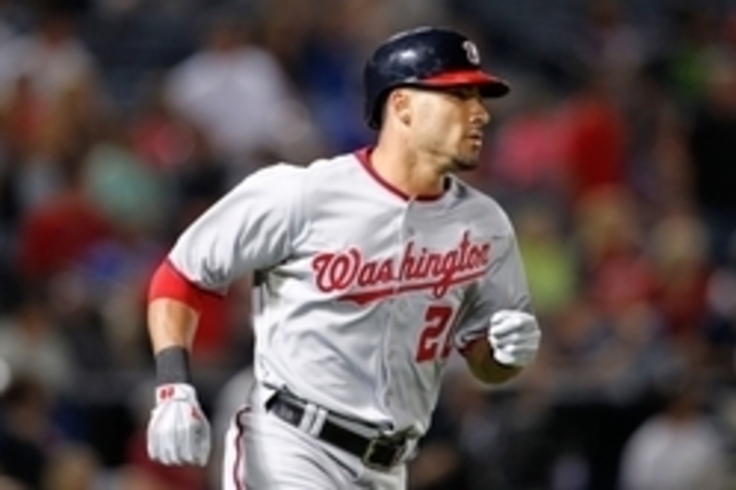 Sep 16, 2014; Atlanta, GA, USA; Washington Nationals shortstop Ian Desmond (20) hits a home run against the Atlanta Braves in the sixth inning at Turner Field. Mandatory Credit: Brett Davis-USA TODAY Sports