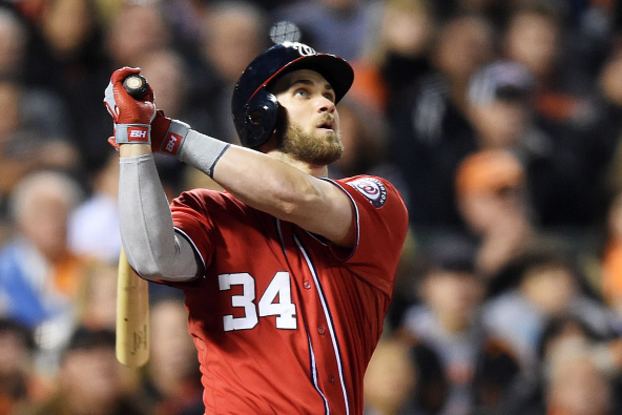 SAN FRANCISCO, CA - OCTOBER 07:  Bryce Harper #34 of the Washington Nationals hits a solo home run in the seventh inning against the San Francisco Giants during Game Four of the National League Division Series at AT&T Park on October 7, 2014 in San Franci