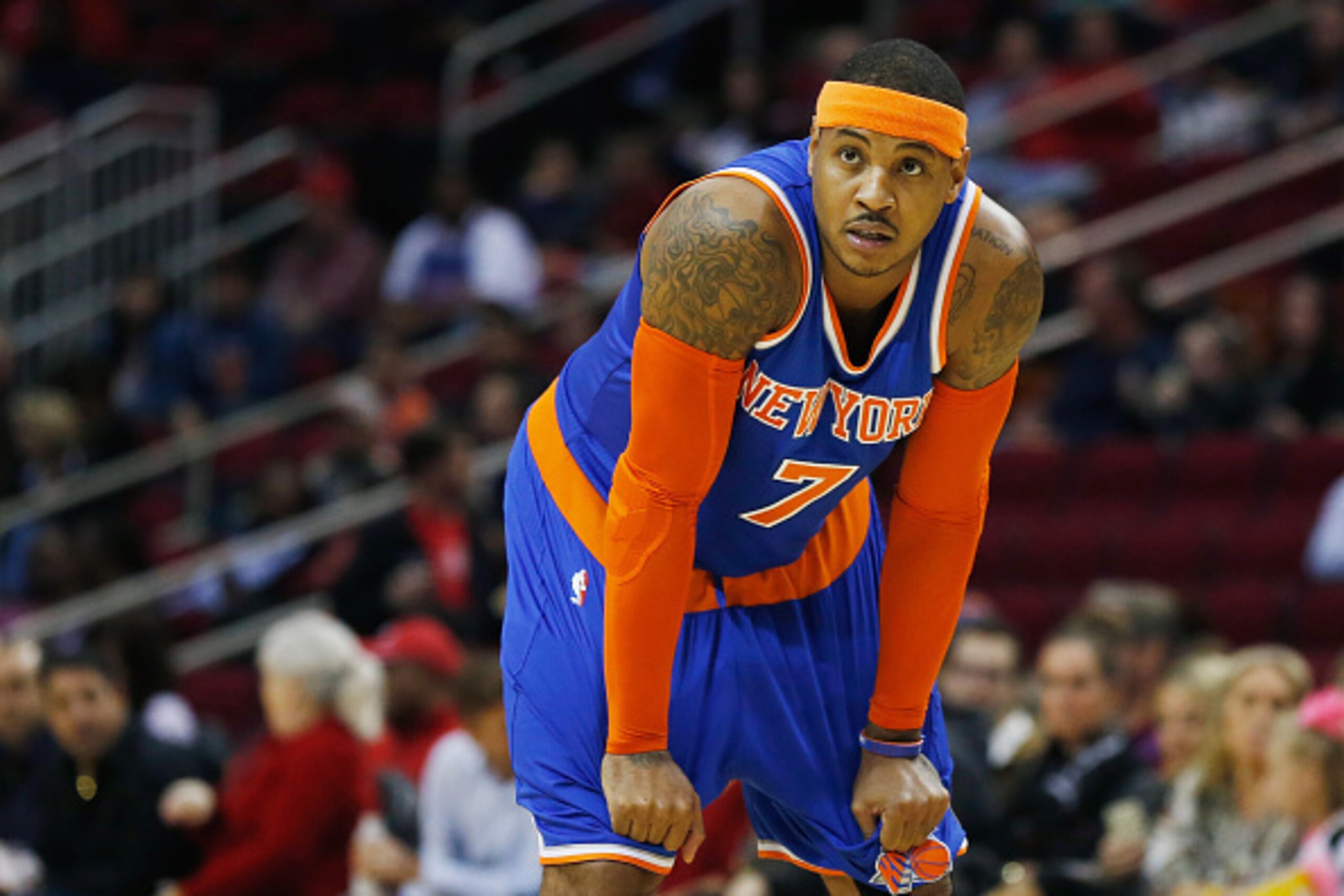 HOUSTON, TX - NOVEMBER 24:  Carmelo Anthony #7 of the New York Knicks waits on the court during their game against the Houston Rockets at the Toyota Center on November 24, 2014 in Houston, Texas.  NOTE TO USER: User expressly acknowledges and agrees that,