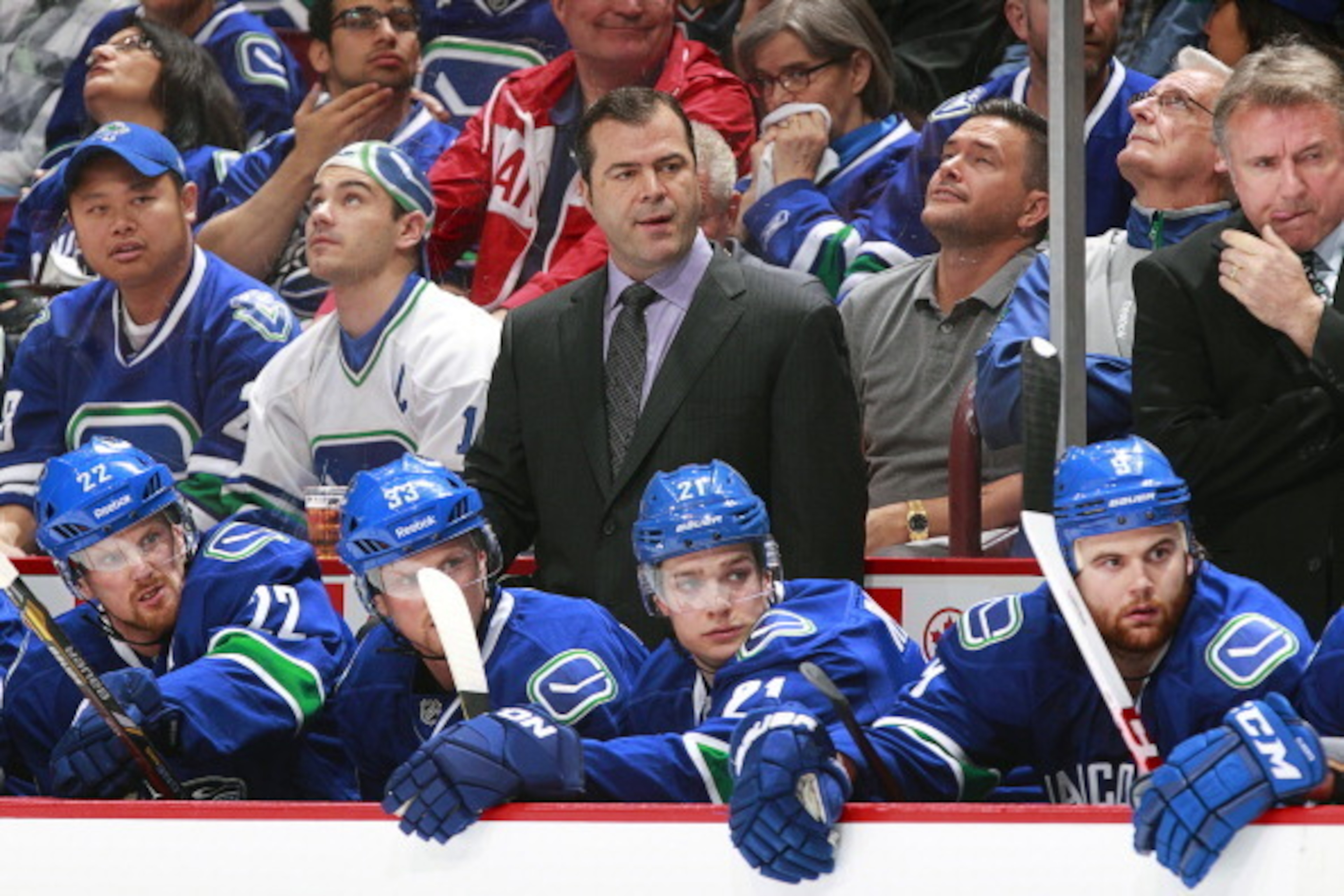 VANCOUVER, CANADA - MAY 1: Head coach Alain Vigneault of the Vancouver Canucks looks on from the bench against the San Jose Sharks during Game One of the Western Conference Quarterfinals during the 2013 NHL Stanley Cup Playoffs at Rogers Arena on May 1, 2