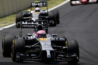 Button leading Magnussen at the Brazilian Grand Prix. Button leading Magnussen at the Brazilian Grand Prix.