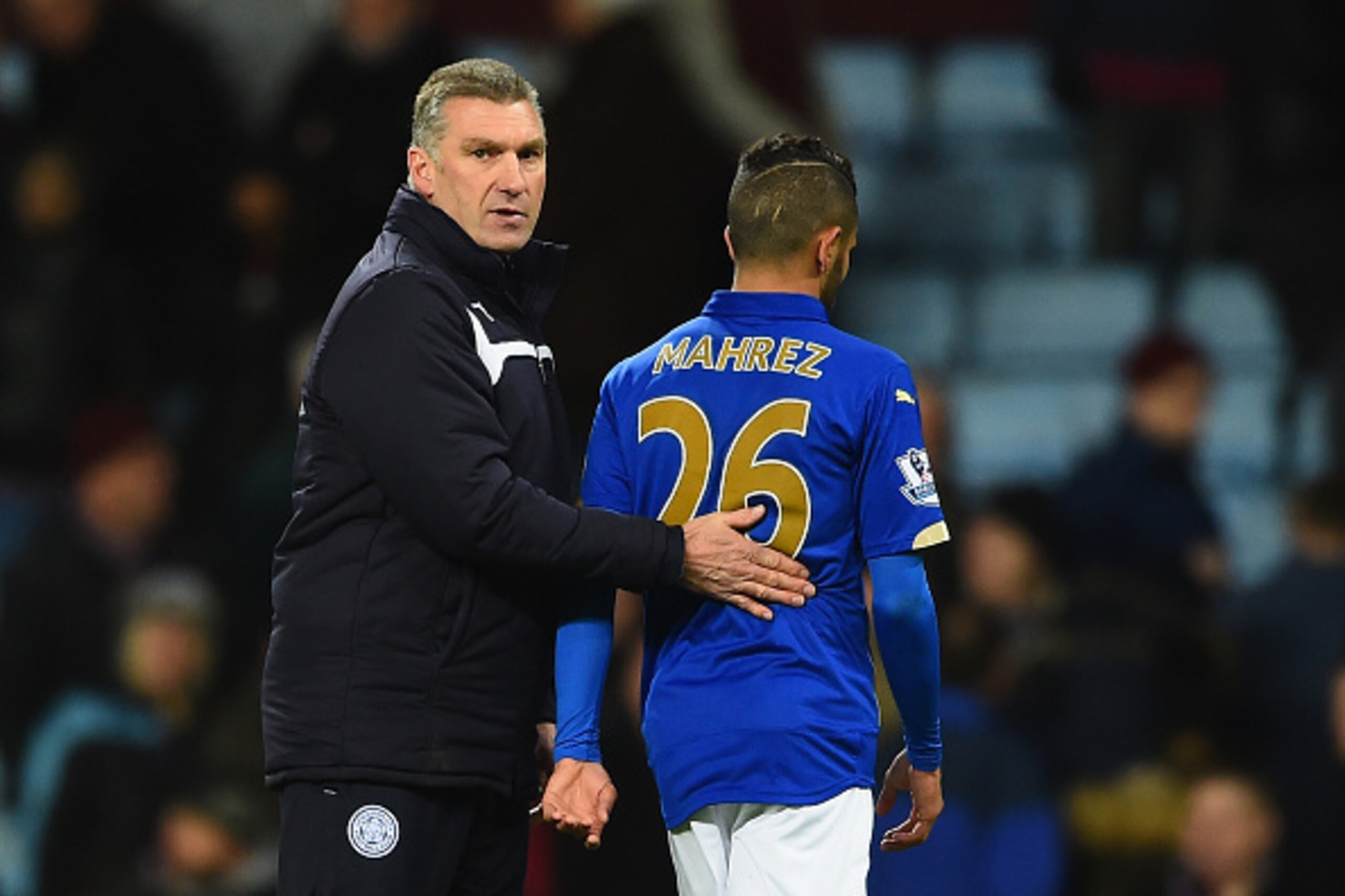 BIRMINGHAM, ENGLAND - DECEMBER 07: Nigel Pearson, manager of Leicester City consoles Riyad Mahrez of Leicester City during the Barclays Premier League match between Aston Villa and Leicester City at Villa Park on December 7, 2014 in Birmingham, England. BIRMINGHAM, ENGLAND - DECEMBER 07: Nigel Pearson, manager of Leicester City consoles Riyad Mahrez of Leicester City during the Barclays Premier League match between Aston Villa and Leicester City at Villa Park on December 7, 2014 in Birmingham, England.