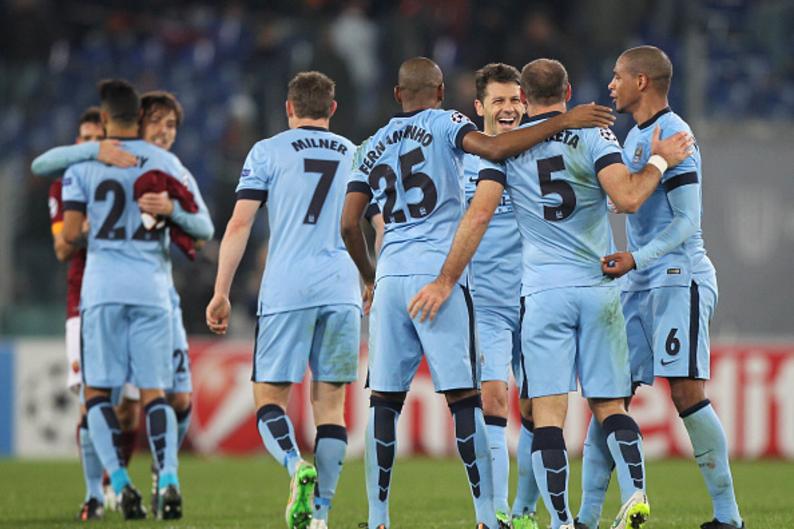 ROME, ITALY - DECEMBER 10: Martin Demichelis (3rd R) of Manchester City celebrates their victory with his team-mates after the UEFA Champions League Group E match between AS Roma and Manchester City FC on December 10, 2014 in Rome, Italy. (Photo by Paol ROME, ITALY - DECEMBER 10: Martin Demichelis (3rd R) of Manchester City celebrates their victory with his team-mates after the UEFA Champions League Group E match between AS Roma and Manchester City FC on December 10, 2014 in Rome, Italy. (Photo by Paol