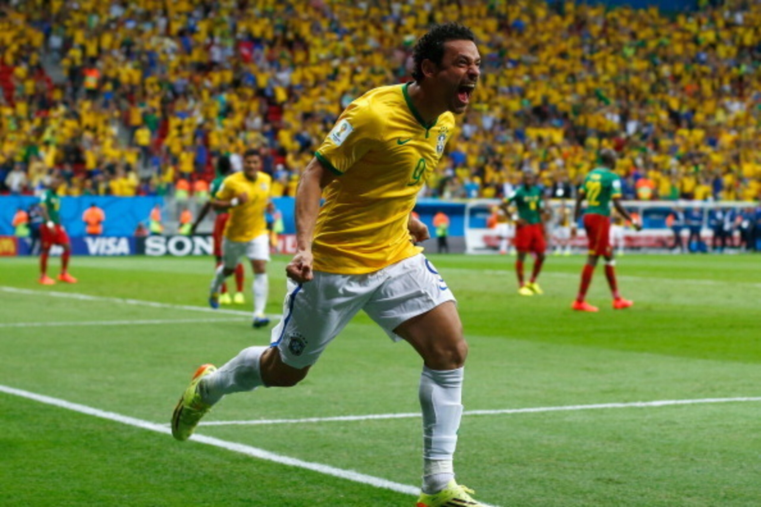 BRASILIA, BRAZIL - JUNE 23: Fred of Brazil celebrates scoring his team's third goal during the 2014 FIFA World Cup Brazil Group A match between Cameroon and Brazil at Estadio Nacional on June 23, 2014 in Brasilia, Brazil.  (Photo by Matthew Lewis/Getty Im