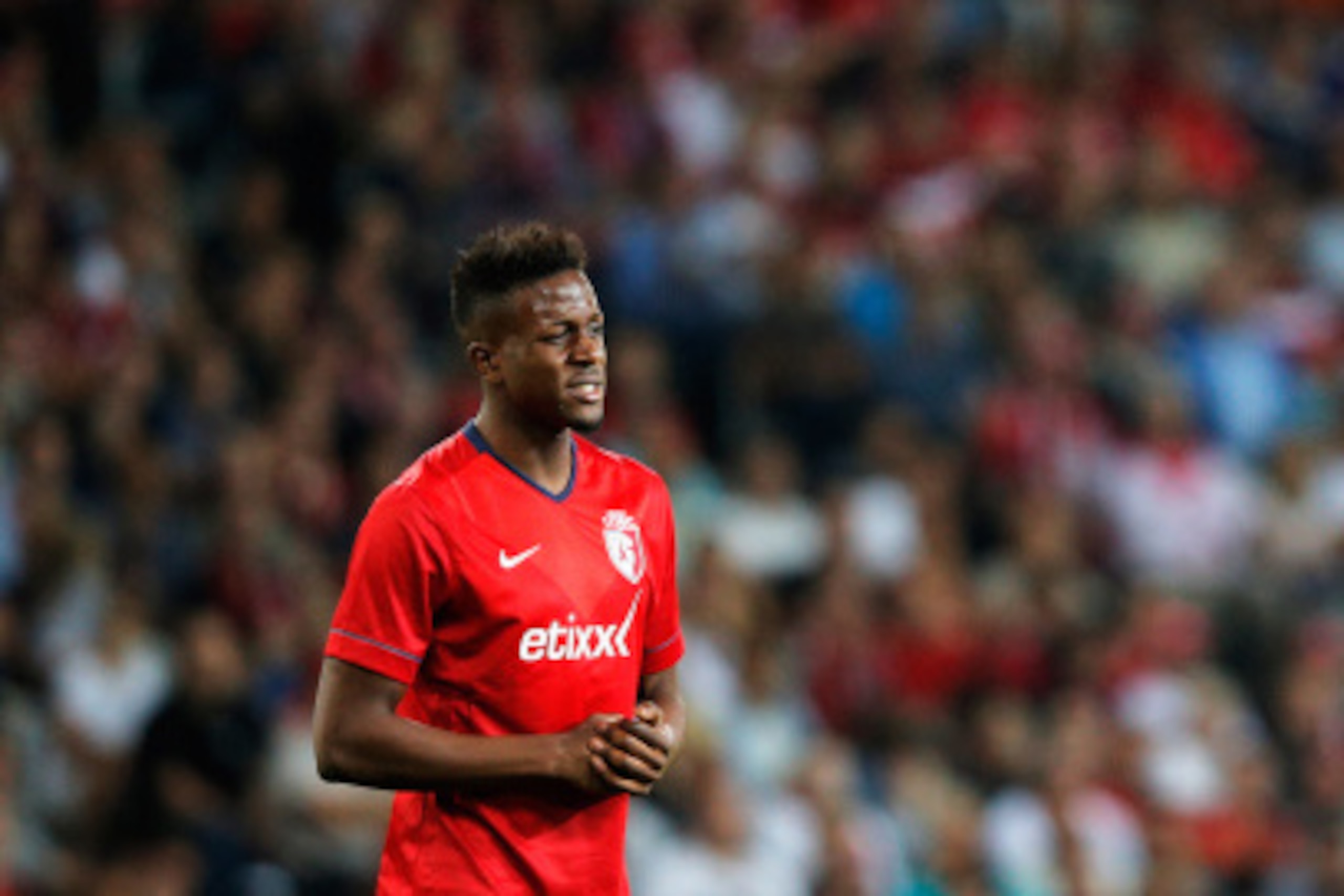 LILLE, FRANCE - AUGUST 05:  Divock Origi of Lille looks on during the UEFA Champions League third qualifying round 2nd leg match between LOSC Lille and Grasshopper Club Zurich at the Stade Pierre-Mauroy on August 5, 2014 in Lille, France.  (Photo by Dean 