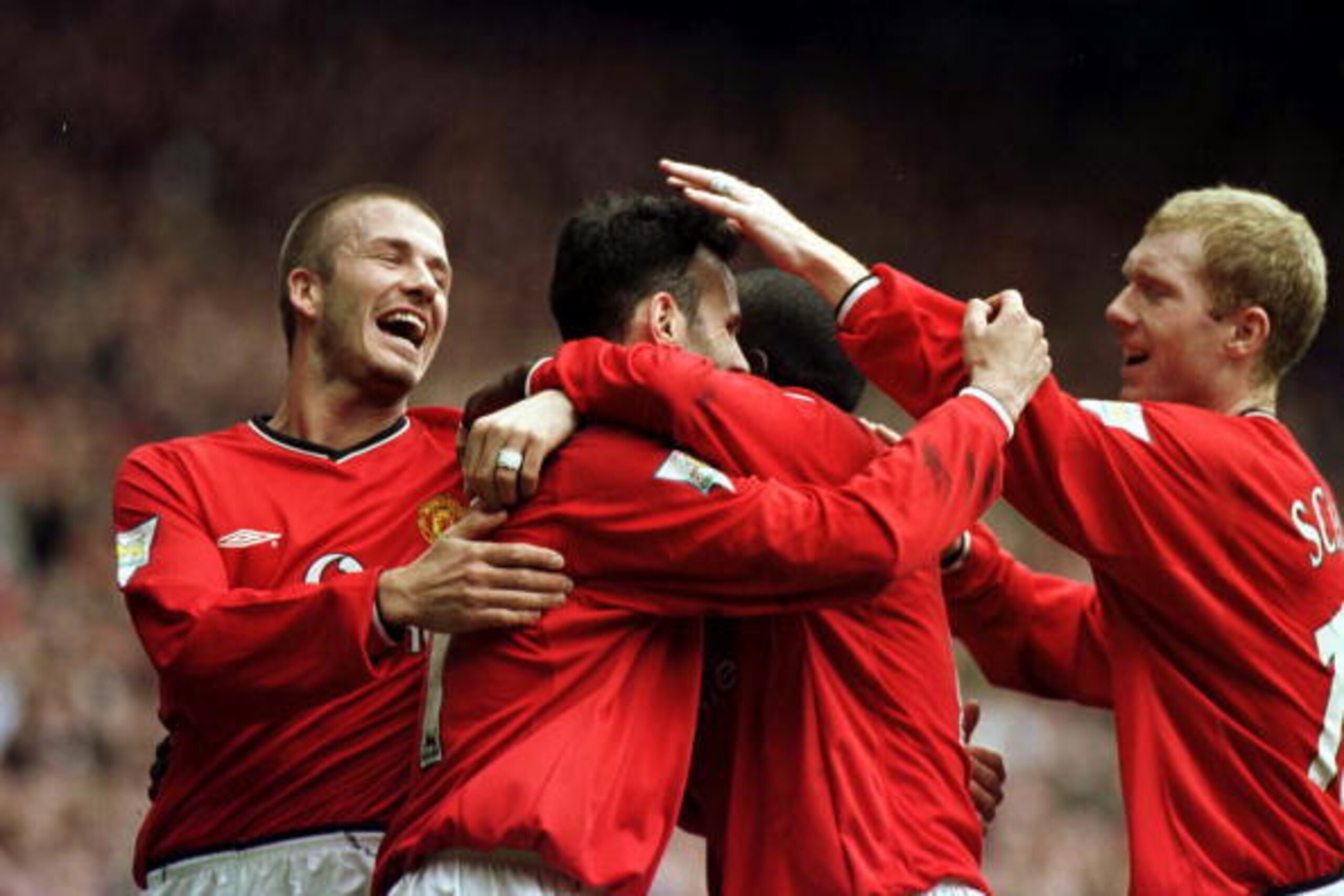 14 Apr 2001:  Ryan Giggs (2nd from left) of Man Utd celebrates with (L to R) David Beckham, Dwight Yorke and Paul Scholes after scoring the third goal during the Manchester United v Coventry City FA Carling Premiership match at Old Trafford, Manchester.Ma