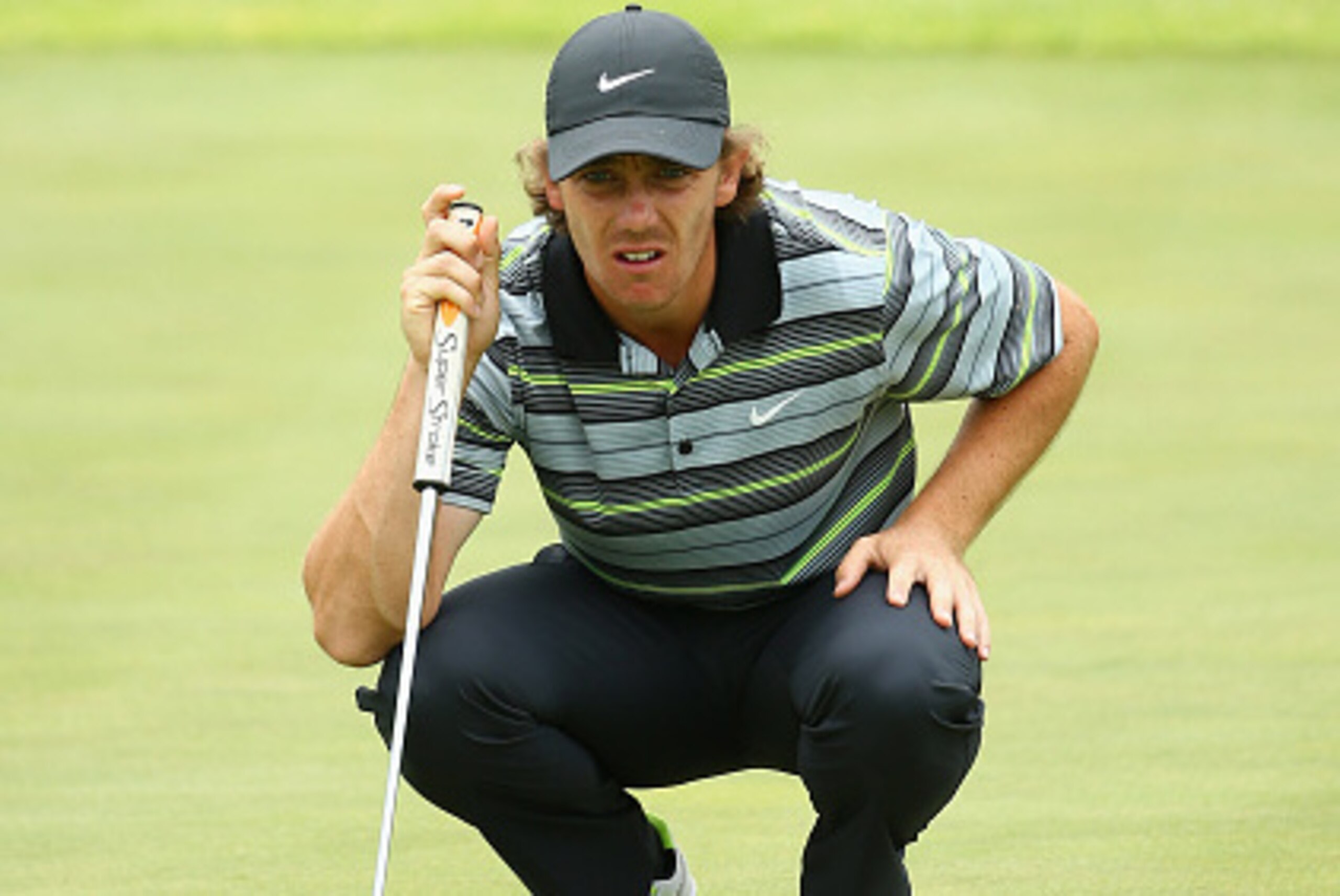SUN CITY, SOUTH AFRICA - DECEMBER 06:  Tommy Fleetwood of England in action during the third round of the Nedbank Golf Challenge at the Gary Player Country Club on December 6, 2014 in Sun City, South Africa.  (Photo by Richard Heathcote/Getty Images)