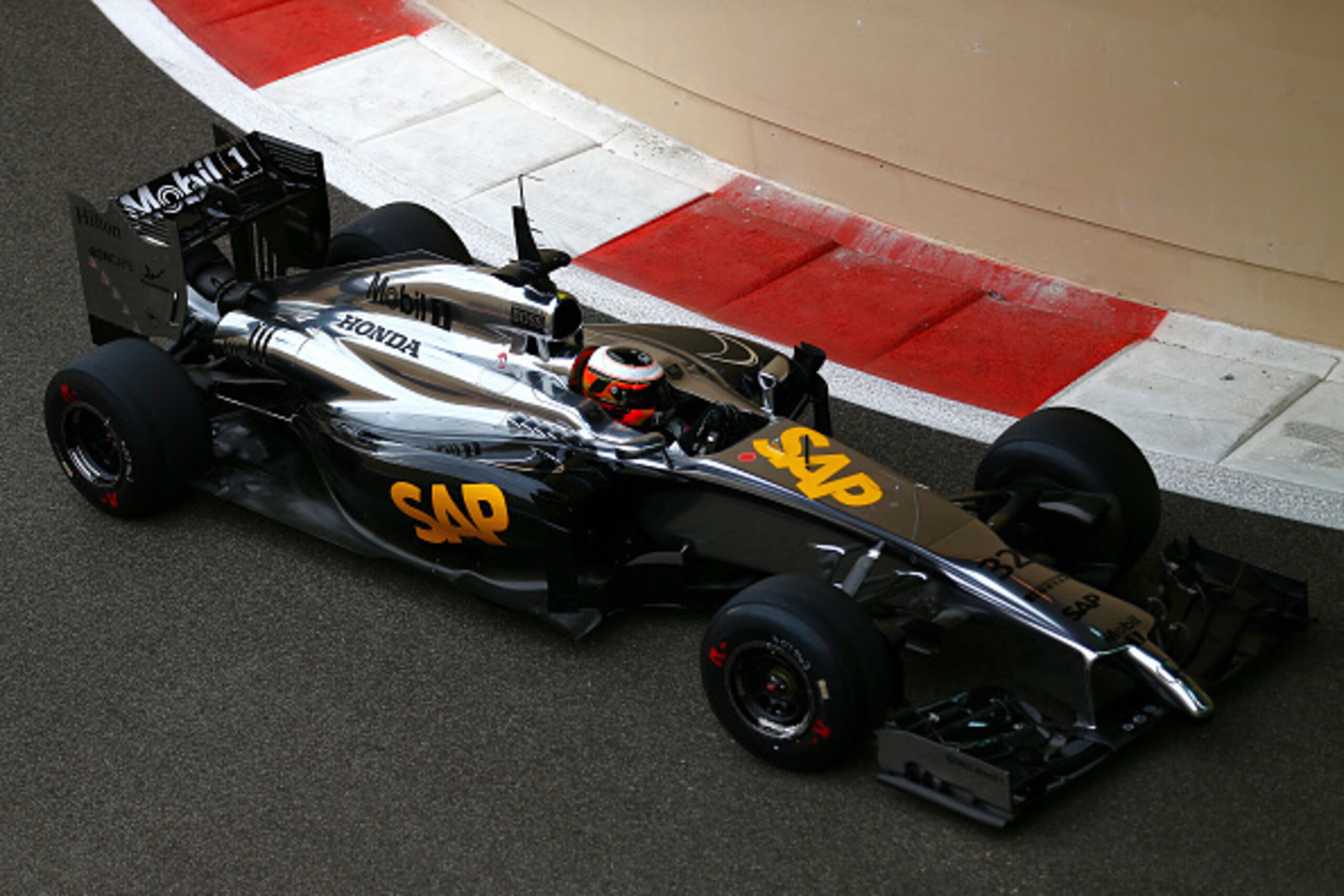 ABU DHABI, UNITED ARAB EMIRATES - NOVEMBER 25:  Stoffel Vandoorne of Belgium and McLaren drives during day one of Formula One testing at Yas Marina Circuit on November 25, 2014 in Abu Dhabi, United Arab Emirates.  (Photo by Dan Istitene/Getty Images)