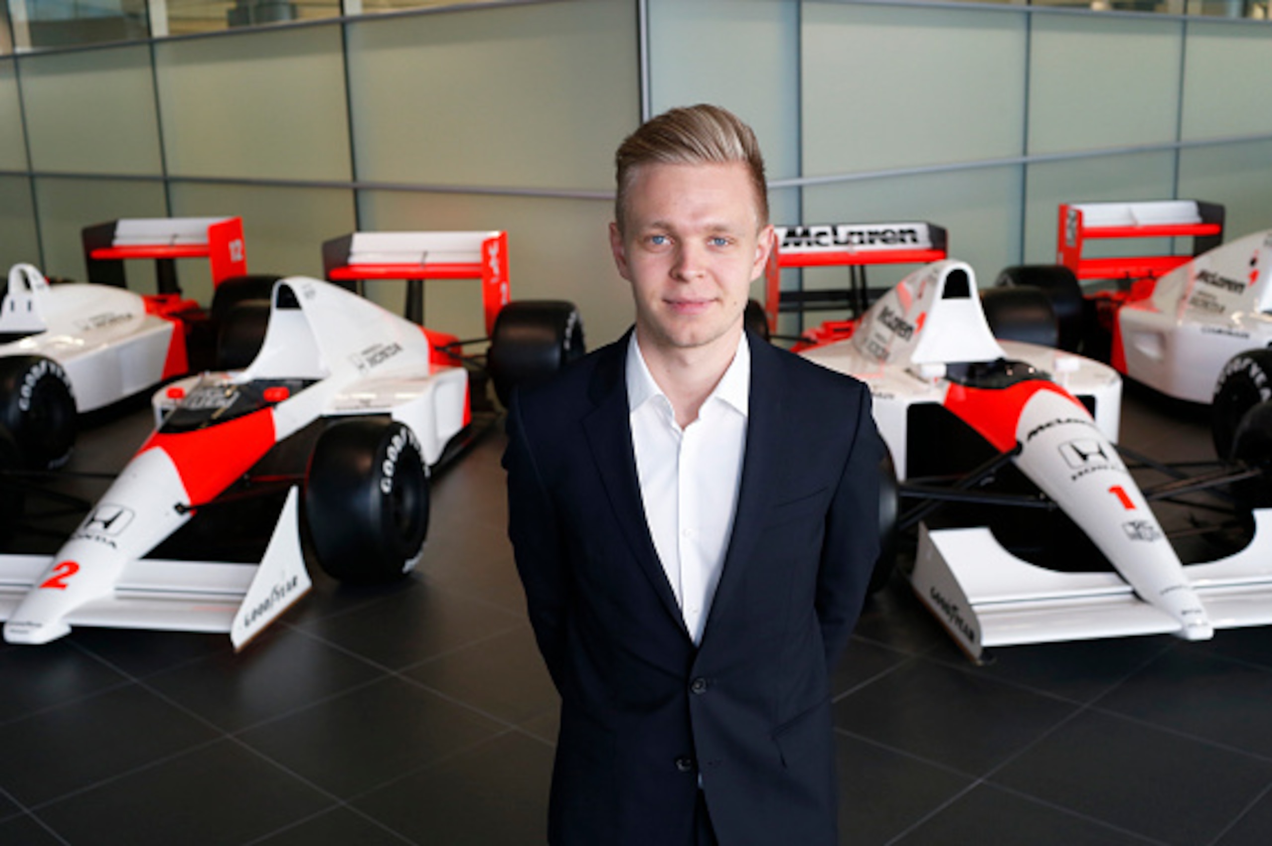 WOKING, ENGLAND- DECEMBER 10: In this handout photo provided by McLaren-Honda, Kevin Magnussen poses as McLaren-Honda announces its new driver line-up for 2015 on December 10, 2014 in Woking, England. Kevin Magnussen will remain as test and reserve driver