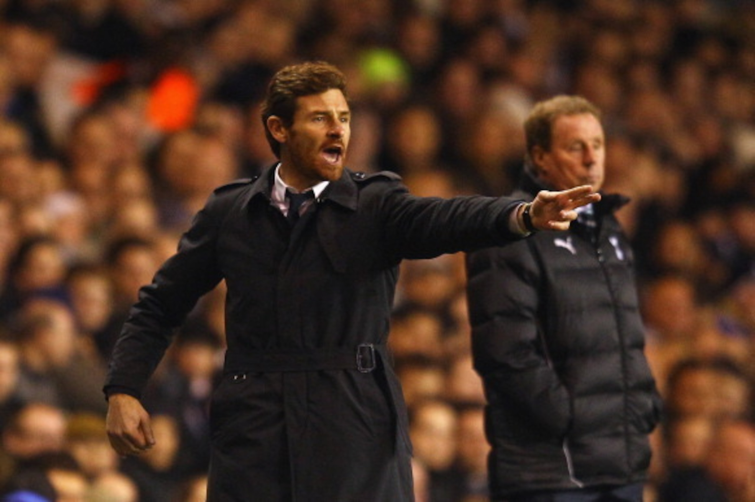 LONDON, ENGLAND - DECEMBER 22:  Manager of Chelsea Andre Villas-Boas gives instructions with Tottenham manager Harry Redknapp during the Barclays Premier League match between Tottenham Hotspur and Chelsea at White Hart Lane on December 22, 2011 in London,