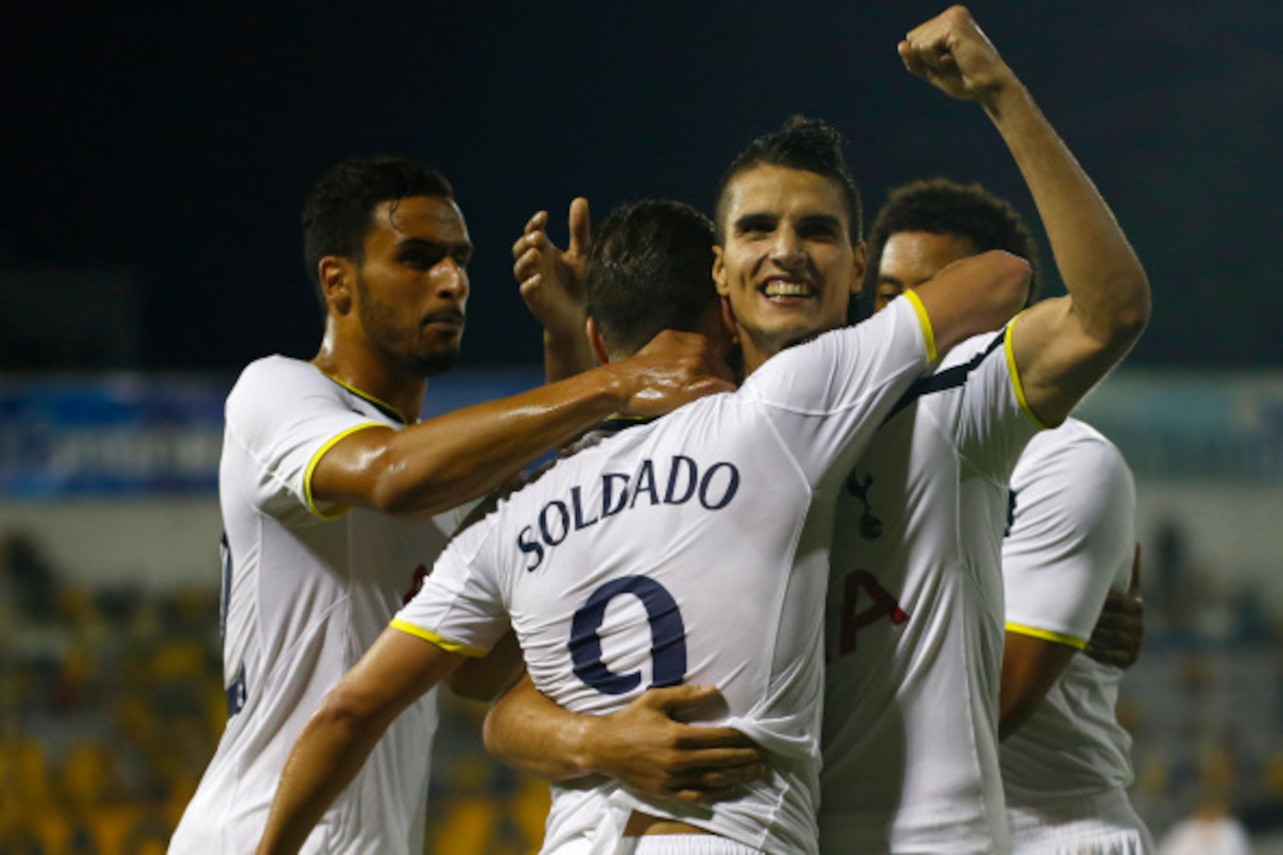 LARNACA, CYPRUS - AUGUST 21:  Roberto Soldado Rillo (C) and Erik Lamela (R) from Tottenham Hotspur celebrate a goal during the AEL Limassol FC v  Tottenham Hotspur - UEFA Europa League Qualifying Play-Off match on August 21, 2014 in Larnaca, Cyprus.  (Pho
