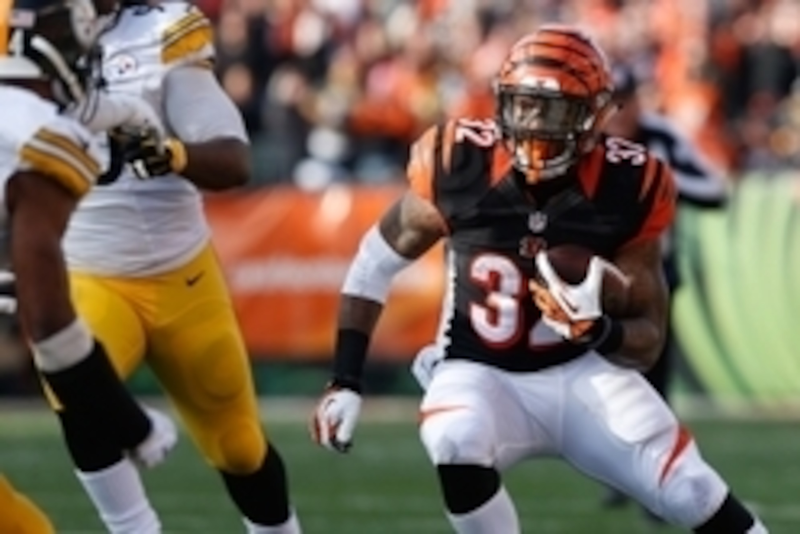Dec 7, 2014; Cincinnati, OH, USA; Cincinnati Bengals running back Jeremy Hill (32) carries the ball after making a catch in the first half against the Pittsburgh Steelers at Paul Brown Stadium. Mandatory Credit: Aaron Doster-USA TODAY Sports