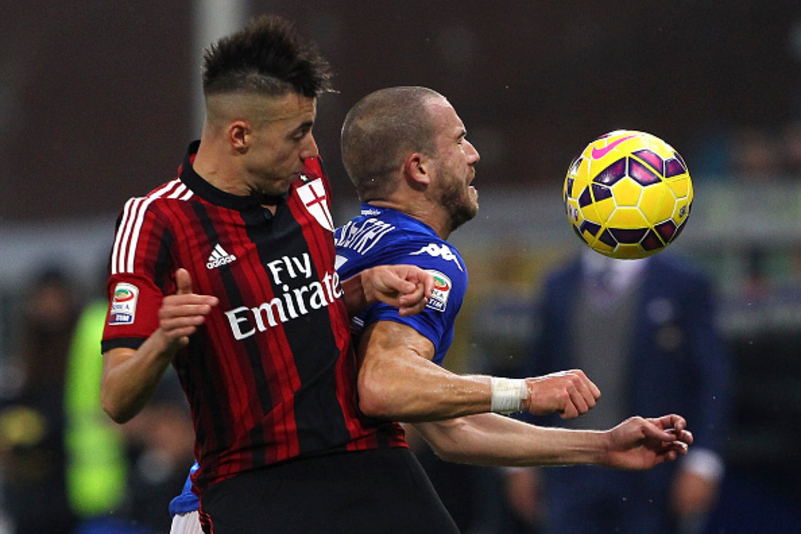 GENOA, ITALY - NOVEMBER 08: Lorenzo De Silvestri (R) of UC Sampdoria competes for the ball with Stephan El Shaarawy (L) of AC Milan during the Serie A match between UC Sampdoria and AC Milan at Stadio Luigi Ferraris on November 8, 2014 in Genoa, Italy. GENOA, ITALY - NOVEMBER 08: Lorenzo De Silvestri (R) of UC Sampdoria competes for the ball with Stephan El Shaarawy (L) of AC Milan during the Serie A match between UC Sampdoria and AC Milan at Stadio Luigi Ferraris on November 8, 2014 in Genoa, Italy.