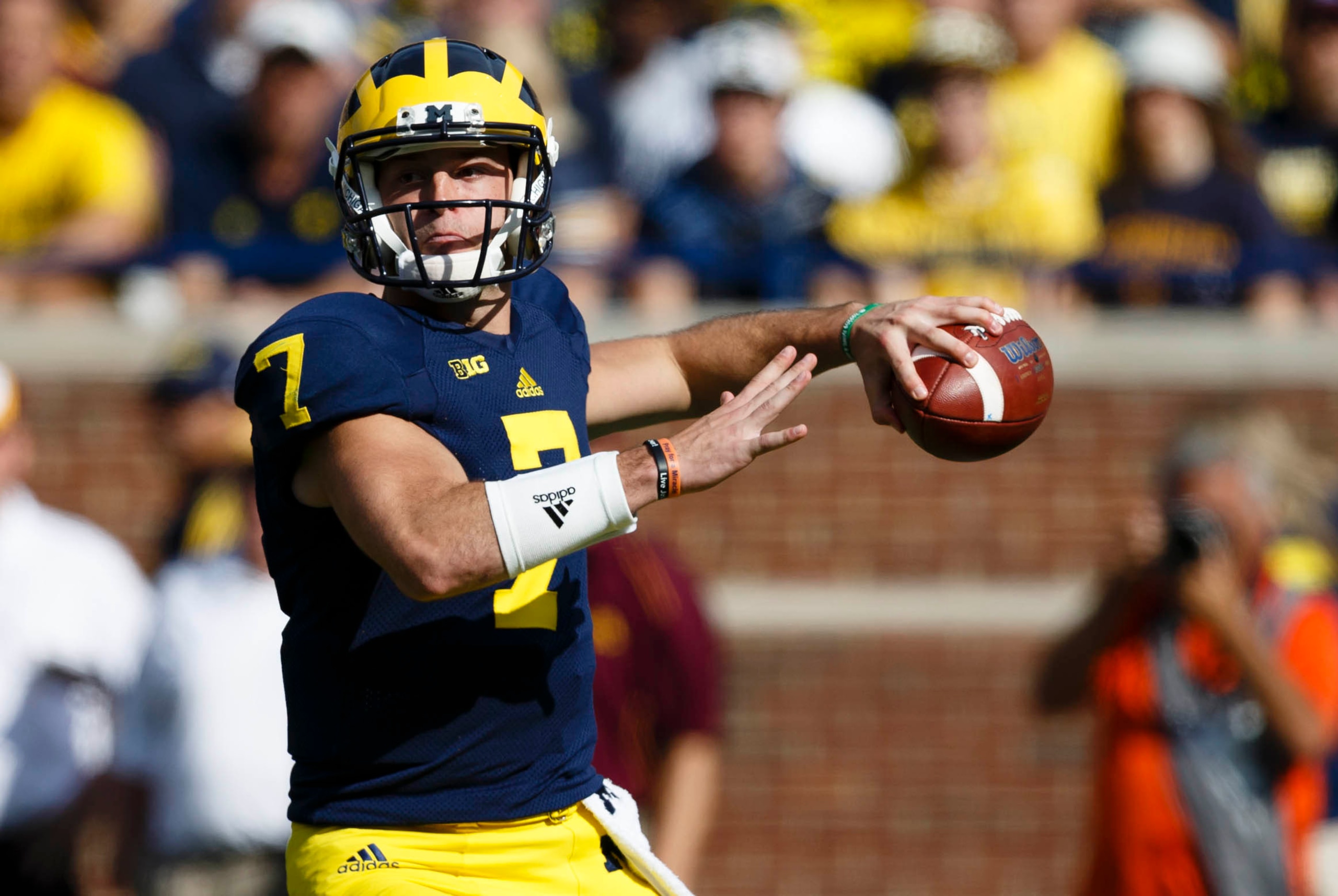 Sep 27, 2014; Ann Arbor, MI, USA; Michigan Wolverines quarterback Shane Morris (7) passes the ball in the first half against the Minnesota Golden Gophers at Michigan Stadium. Mandatory Credit: Rick Osentoski-USA TODAY Sports Sep 27, 2014; Ann Arbor, MI, USA; Michigan Wolverines quarterback Shane Morris (7) passes the ball in the first half against the Minnesota Golden Gophers at Michigan Stadium. Mandatory Credit: Rick Osentoski-USA TODAY Sports