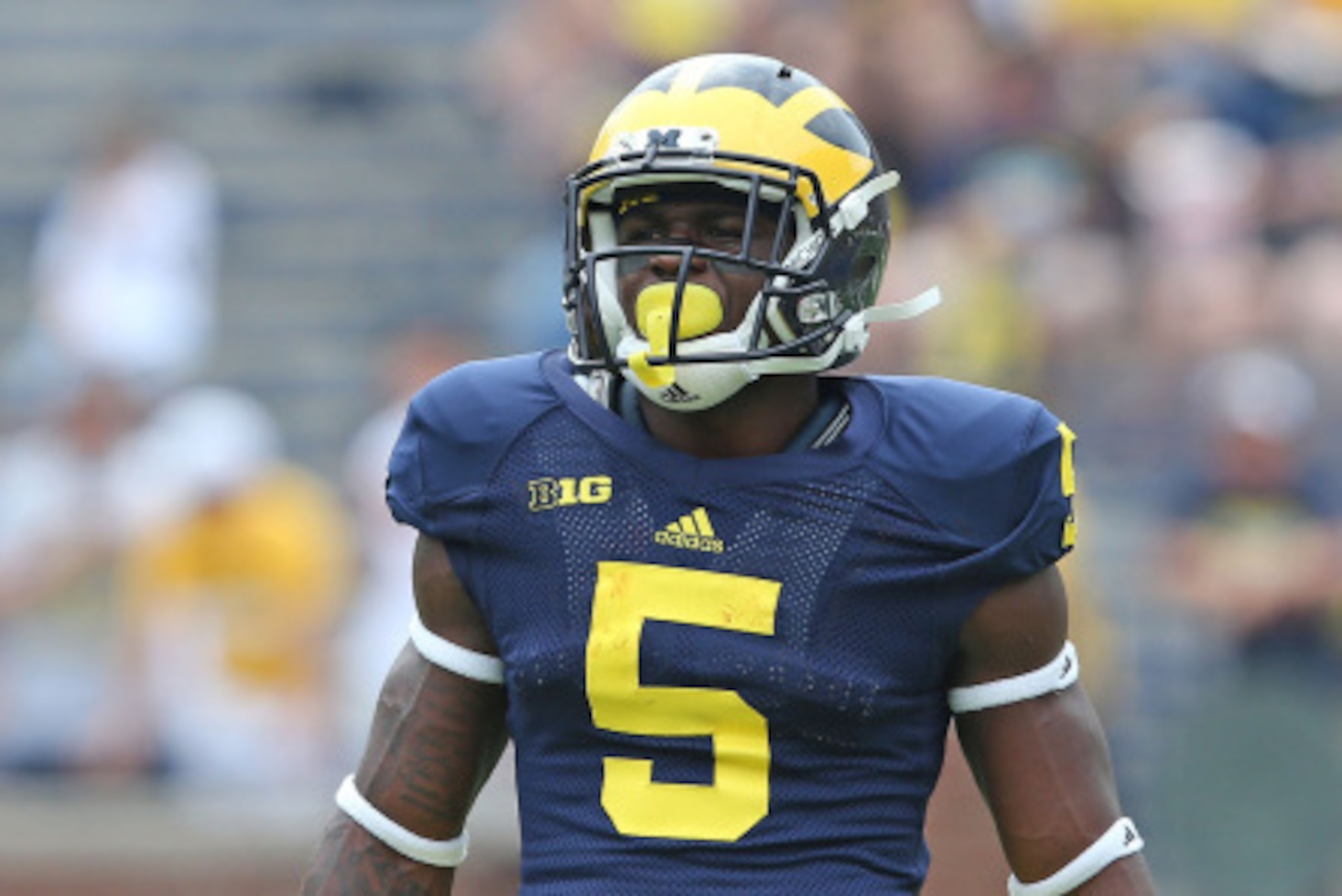ANN ARBOR, MI - AUGUST 30: Jabrill Peppers #5 of the Michigan Wolverines warms up prior to the start of the game against the Appalachian State Mountaineers on August 30, 2014 in Ann Arbor, Michigan. The Wolverines defeated the Mountaineers 52-14. (Photo ANN ARBOR, MI - AUGUST 30: Jabrill Peppers #5 of the Michigan Wolverines warms up prior to the start of the game against the Appalachian State Mountaineers on August 30, 2014 in Ann Arbor, Michigan. The Wolverines defeated the Mountaineers 52-14. (Photo