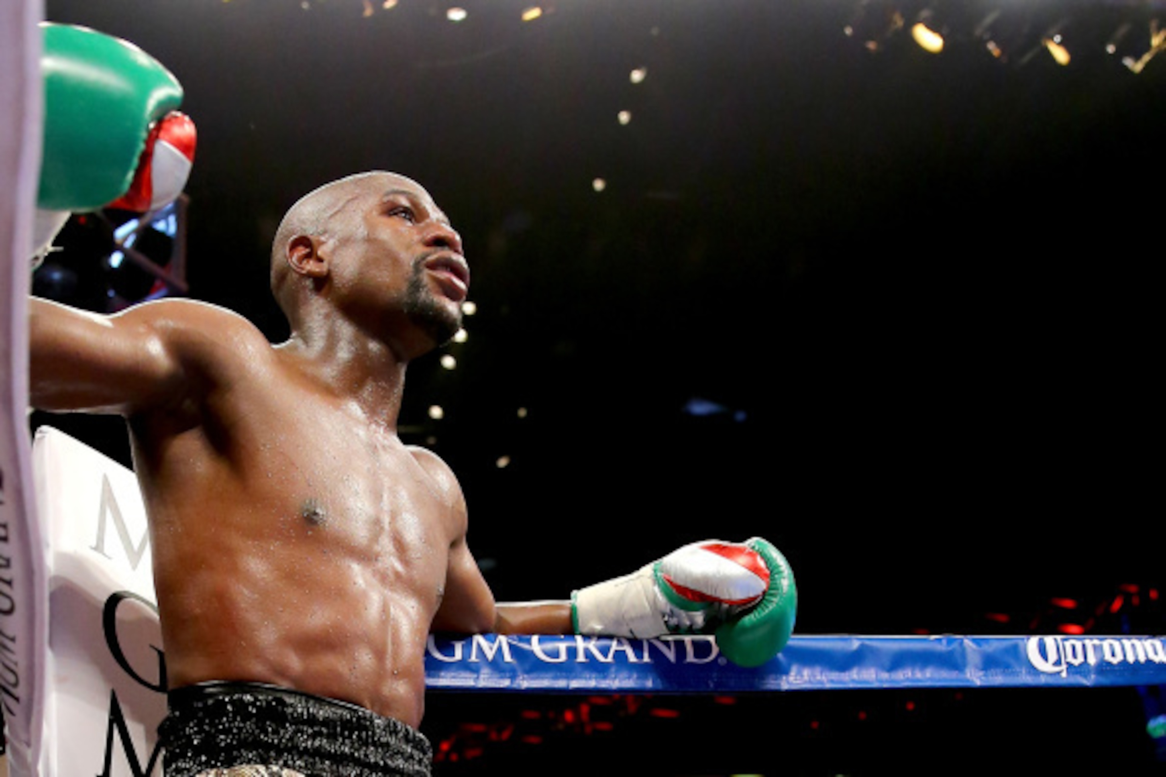 LAS VEGAS, NV - SEPTEMBER 13:  Floyd Mayweather Jr. looks on while taking on Marcos Maidana during their WBC/WBA welterweight title fight at the MGM Grand Garden Arena on September 13, 2014 in Las Vegas, Nevada.  (Photo by Al Bello/Getty Images)