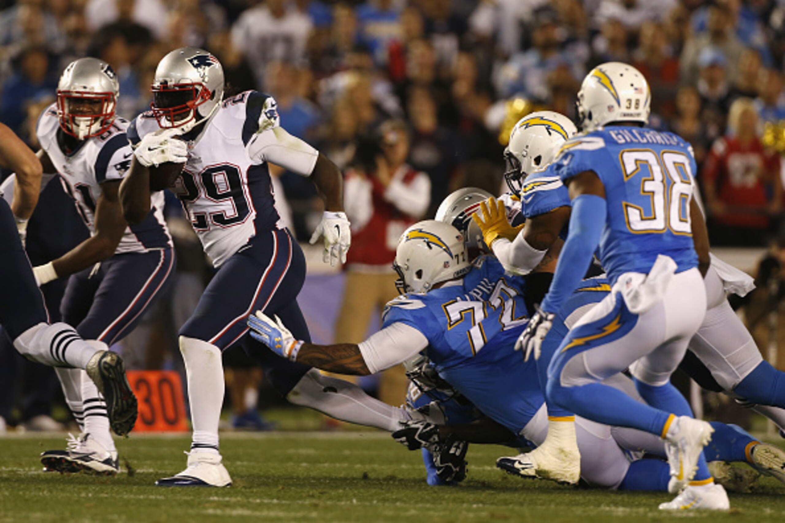 SAN DIEGO, CA - DECEMBER 07:  Running back LeGarrette Blount #29 of the New England Patriots rushes against the San Diego Chargers defense at Qualcomm Stadium on December 7, 2014 in San Diego, California.  (Photo by Todd Warshaw/Getty Images)