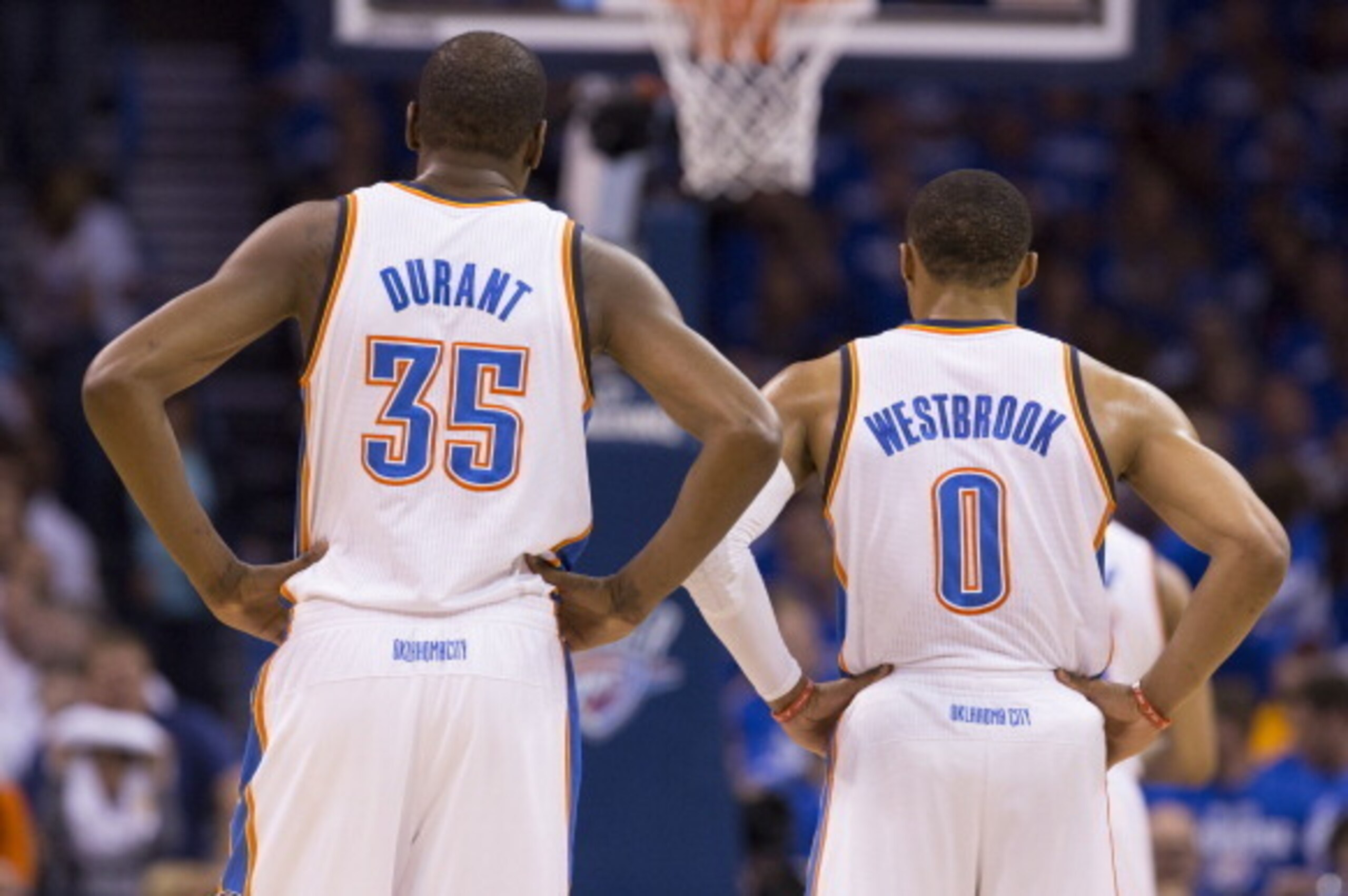 OKLAHOMA CITY, OK - May 27:  Kevin Durant #35 and Russell Westbrook #0 of the Oklahoma City Thunder look on against the San Antonio Spurs in Game 4 of the Western Conference Finals during the 2014 NBA Playoffs at the Chesapeake Arena on May 27, 2014 in Ok