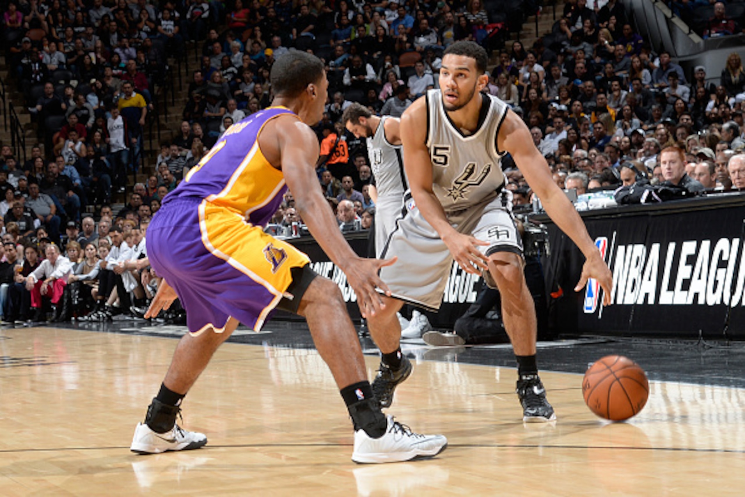 SAN ANTONIO - DECEMBER 12: Cory Joseph #5 of the San Antonio Spurs handles the ball against the Los Angeles Lakers at the AT&T Center on December 12, 2014 in San Antonio, Texas. NOTE TO USER: User expressly acknowledges and agrees that, by downloading and