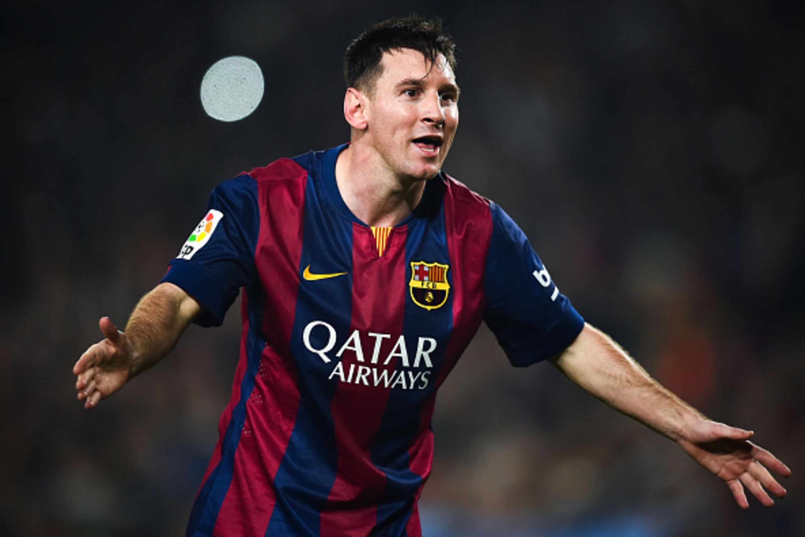BARCELONA, SPAIN - NOVEMBER 22:  Lionel Messi of FC Barcelona celebrates  after scoring his team's fourth goal during the La Liga match between FC Barcelona and Sevilla FC at Camp Nou on November 22, 2014 in Barcelona, Spain. Lionel Messi beat the record 