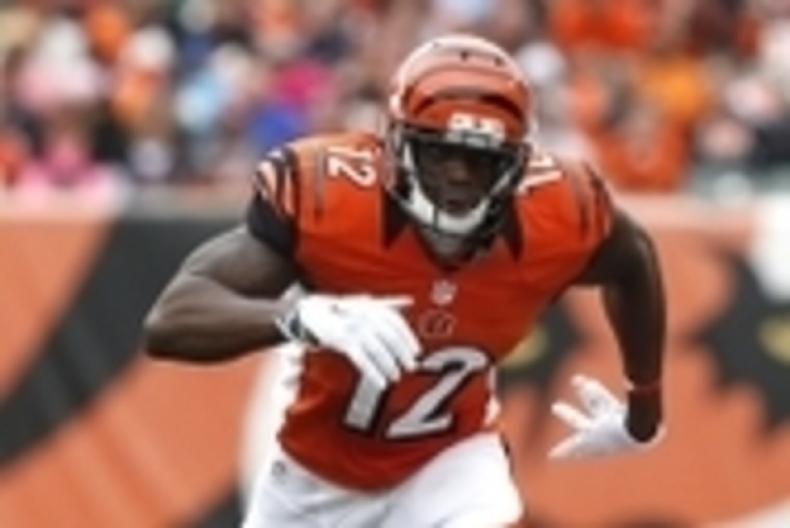 Oct 12, 2014; Cincinnati, OH, USA; Cincinnati Bengals wide receiver Mohamed Sanu (12) against the Carolina Panthers at Paul Brown Stadium. The Bengals and the Panthers tie in overtime 37-37. Mandatory Credit: Aaron Doster-USA TODAY Sports