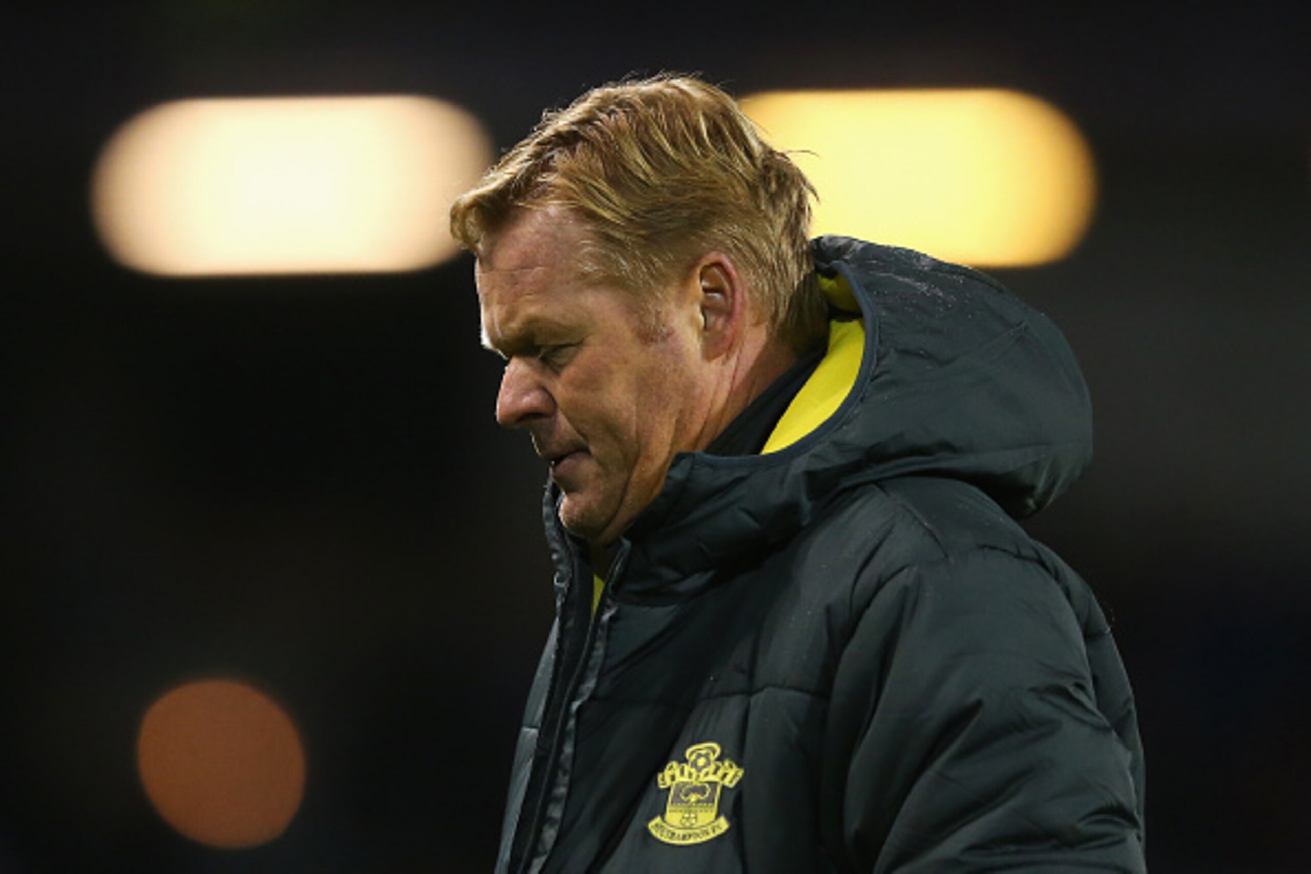 BURNLEY, ENGLAND - DECEMBER 13: Ronald Koeman, manager of Southampton leaves the field after the Barclays Premier League match between Burnley and Southampton at Turf Moor on December 13, 2014 in Burnley, England.  (Photo by Alex Livesey/Getty Images)