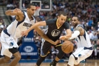 Dec 13, 2014; Dallas, TX, USA; Dallas Mavericks forward Brandan Wright (34) and guard Jameer Nelson (14) fight for the ball with Golden State Warriors guard Stephen Curry (30) during the second half at the American Airlines Center. The Warriors defeated t