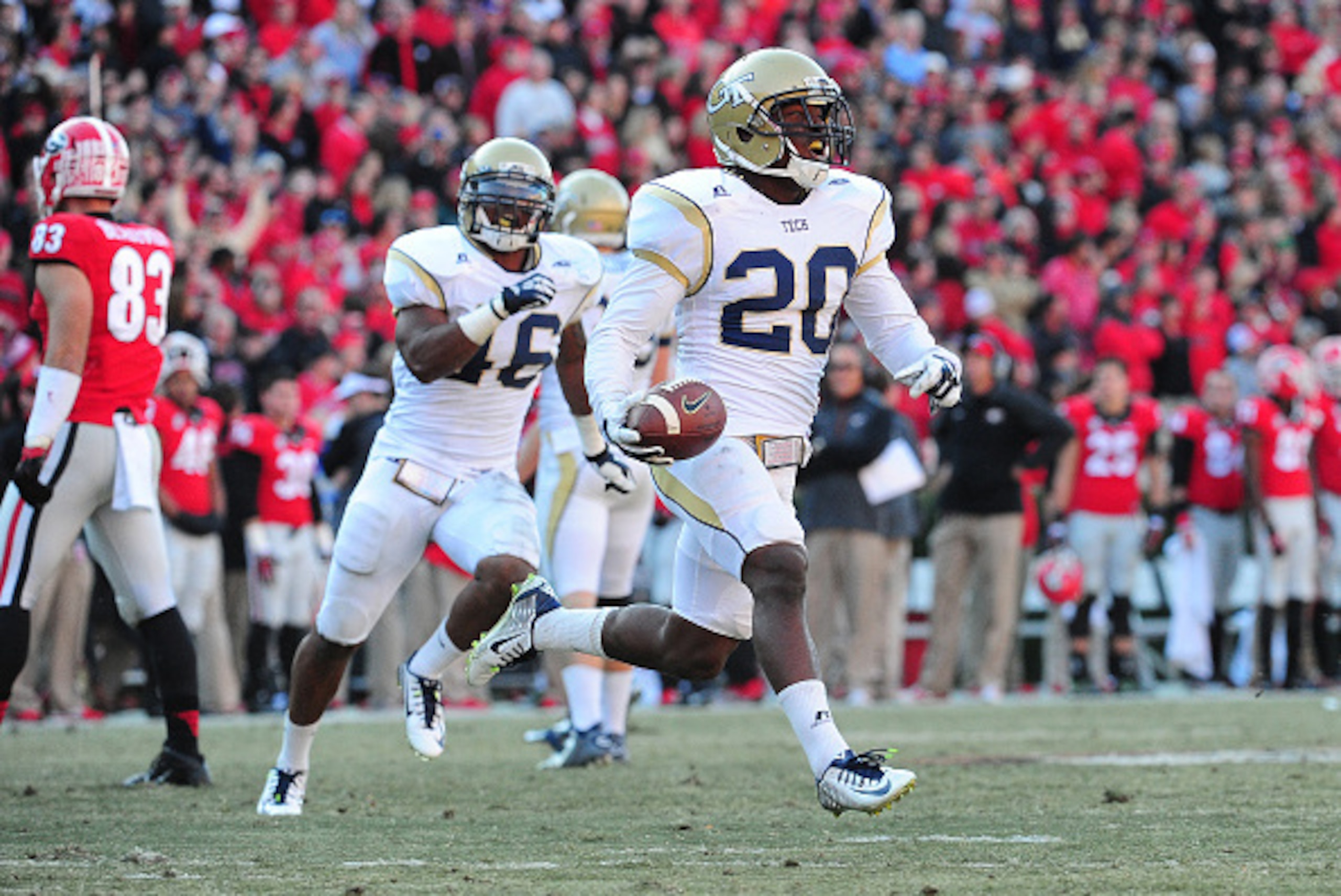 ATHENS, GA - NOVEMBER 29: Lawrence Austin #20 of the Georgia Tech Yellow Jackets celebrates after recovering an onsides kick against the Georgia Bulldogs at Sanford Stadium on November 29, 2014 in Athens, Georgia. (Photo by Scott Cunningham/Getty Images)