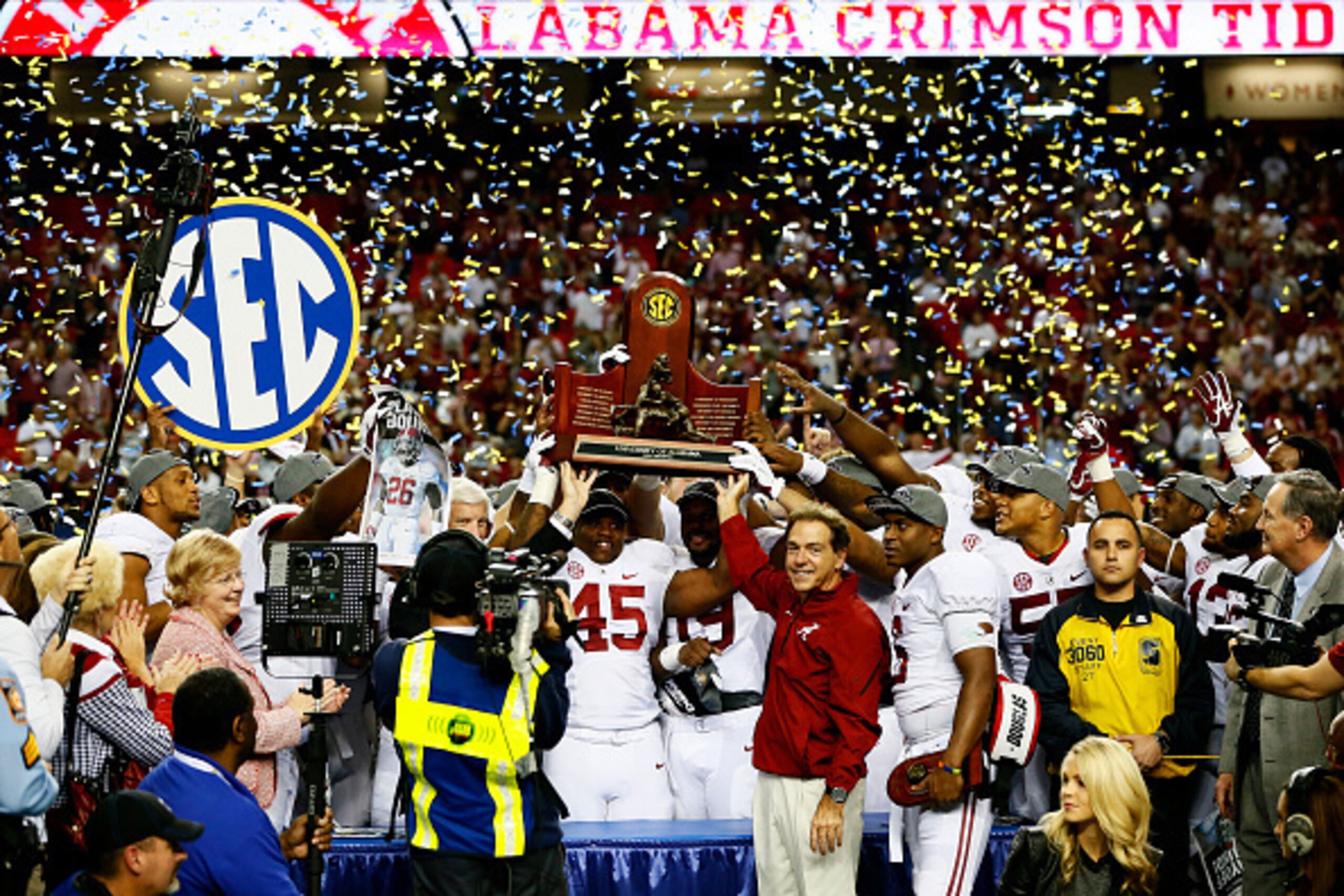 ATLANTA, GA - DECEMBER 06:  Head coach Nick Saban, Blake Sims #6 and the Alabama Crimson Tide celebrate their 42 to 13 win over the Missouri Tigers in the SEC Championship game at the Georgia Dome on December 6, 2014 in Atlanta, Georgia.  (Photo by Kevin 
