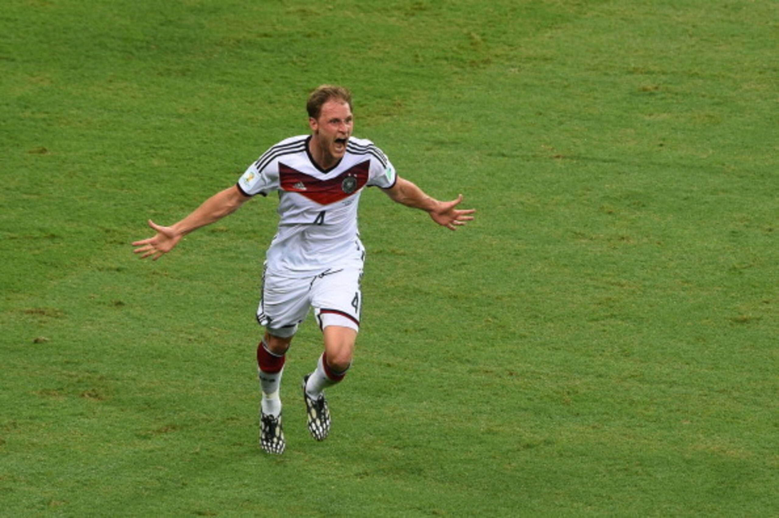 FORTALEZA, BRAZIL - JUNE 21: Benedikt Hoewedes of Germany celebrates after his team's second goal during the 2014 FIFA World Cup Brazil Group G match between Germany and Ghana at Castelao on June 21, 2014 in Fortaleza, Brazil.  (Photo by Jamie McDonald/Ge