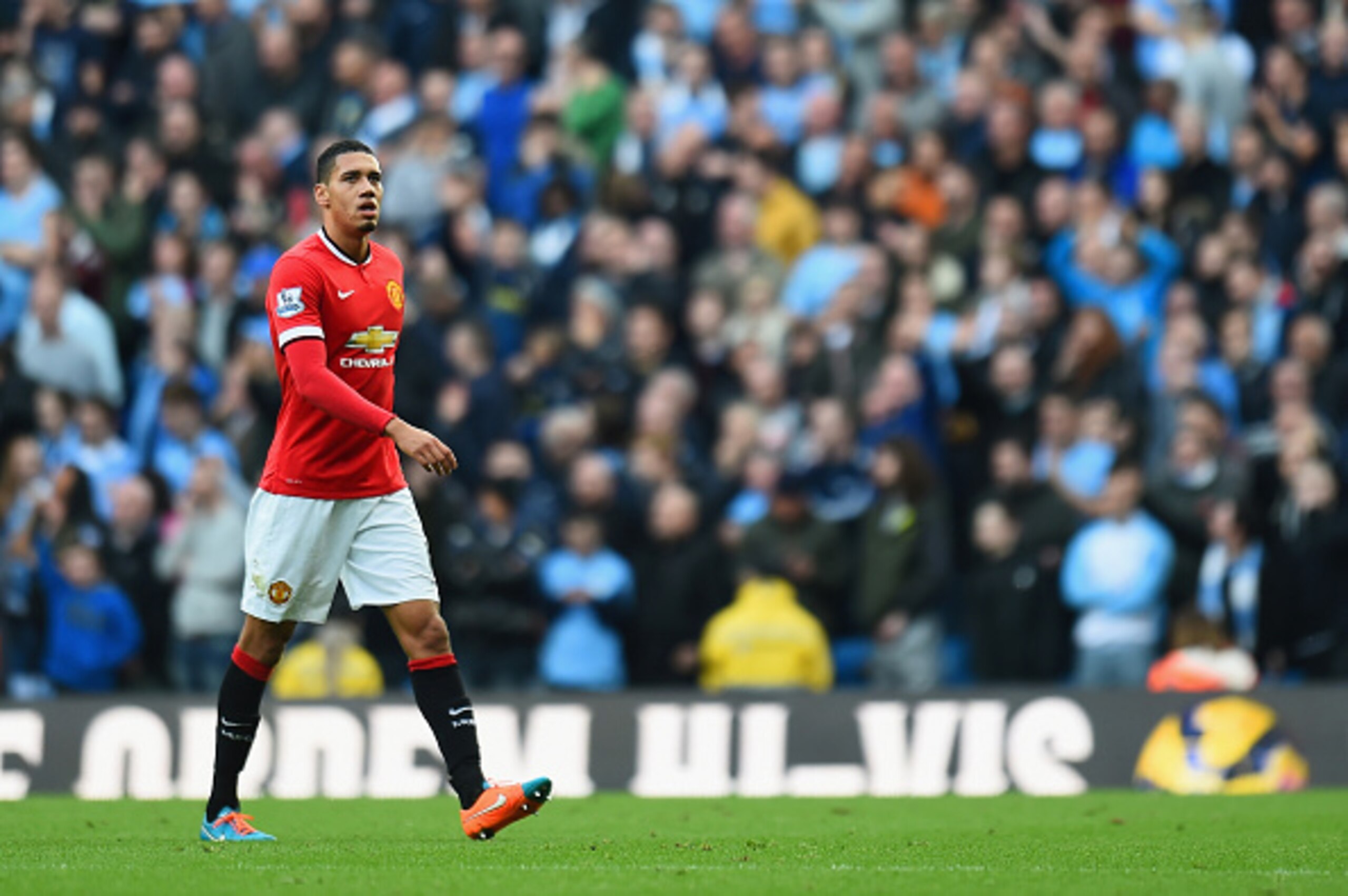 MANCHESTER, ENGLAND - NOVEMBER 02:  Chris Smalling of Manchester United leaves the field after receiving a red card during the Barclays Premier League match between Manchester City and Manchester United at Etihad Stadium on November 2, 2014 in Manchester,