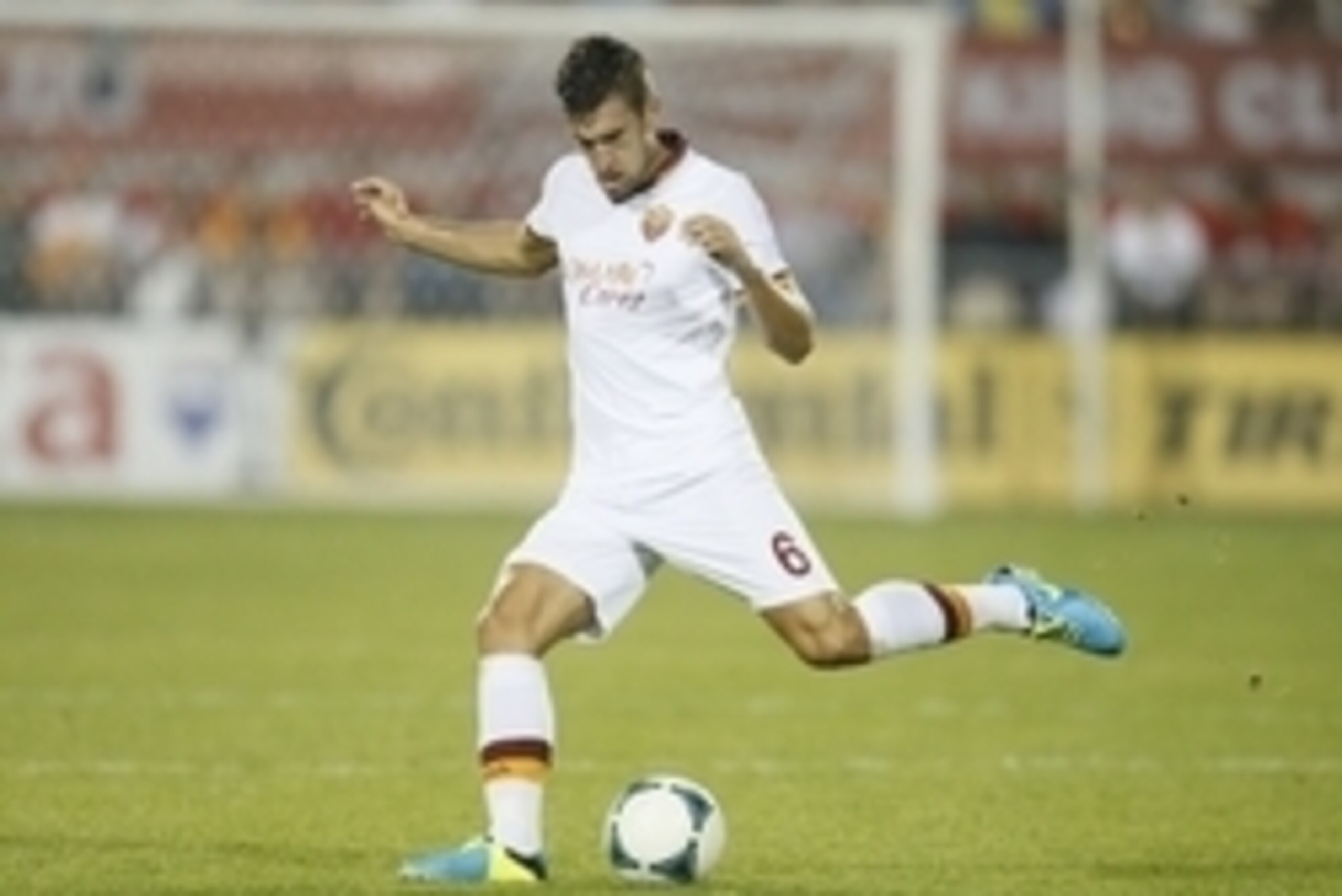 Aug 7, 2013; Toronto, Ontario, Canada; AS Roma midfielder Kevin Strootman (6) kicks the ball against Toronto FC at BMO Field. AS Roma defeated Toronto 4-1. Mandatory Credit: John E. Sokolowski-USA TODAY Sports