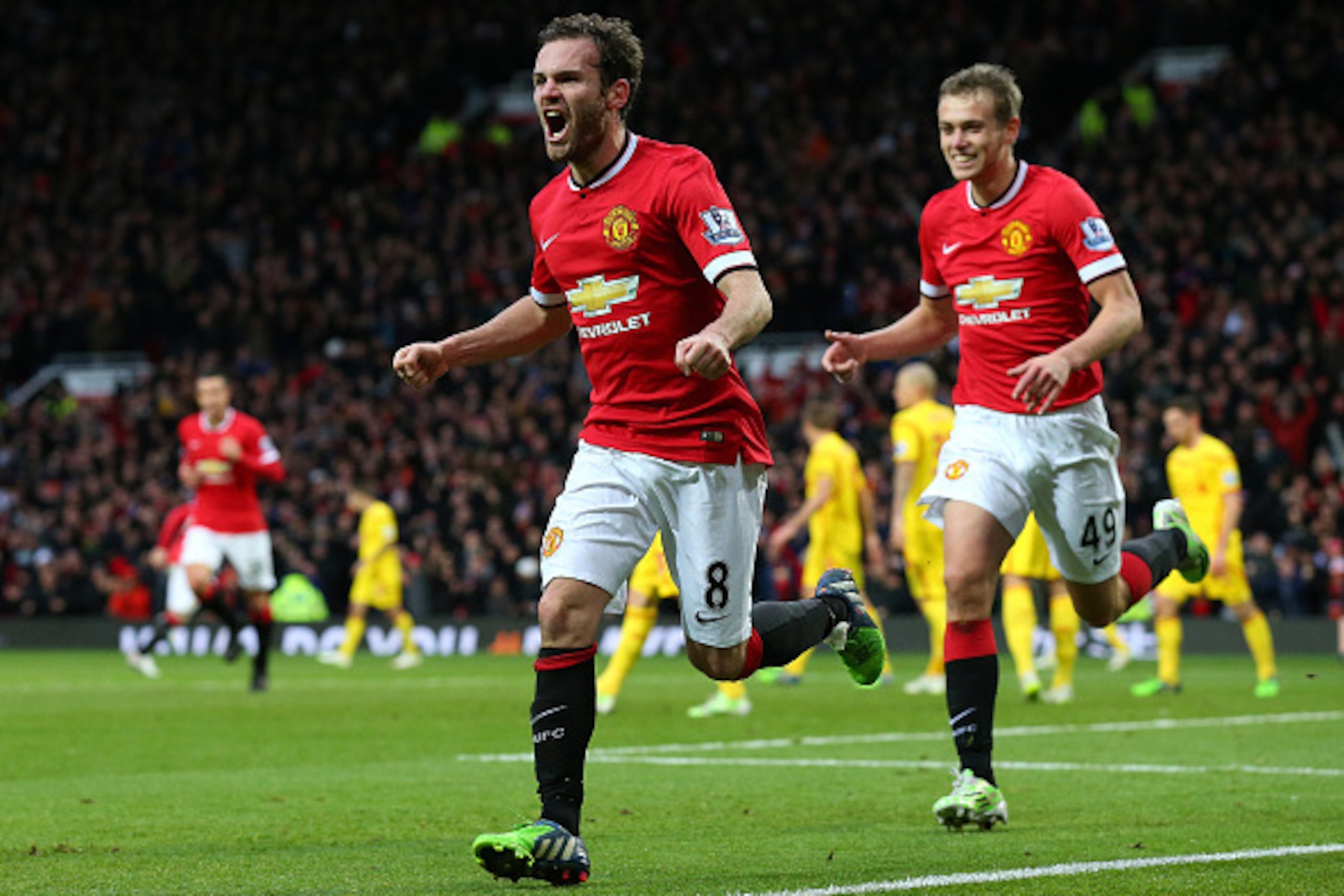 MANCHESTER, ENGLAND - DECEMBER 14:  Juan Mata of Manchester United celebrates scoring the second goal during the Barclays Premier League match between Manchester United and Liverpool at Old Trafford on December 14, 2014 in Manchester, England.  (Photo by 
