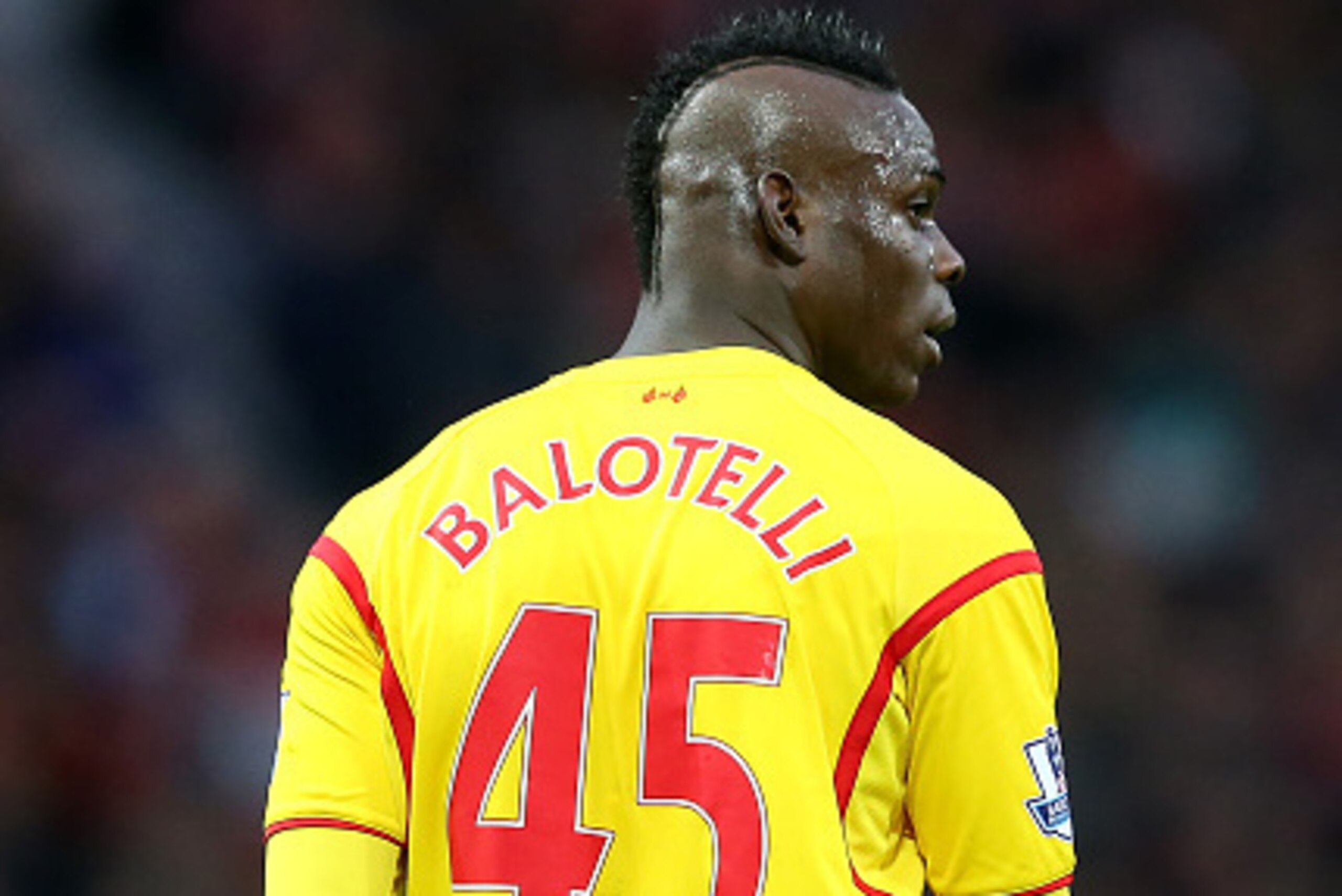 MANCHESTER, ENGLAND - DECEMBER 14:  Mario Balotelli of Liverpool looks on during the Barclays Premier League match between Manchester United and Liverpool at Old Trafford on December 14, 2014 in Manchester, England.  (Photo by Alex Livesey/Getty Images)