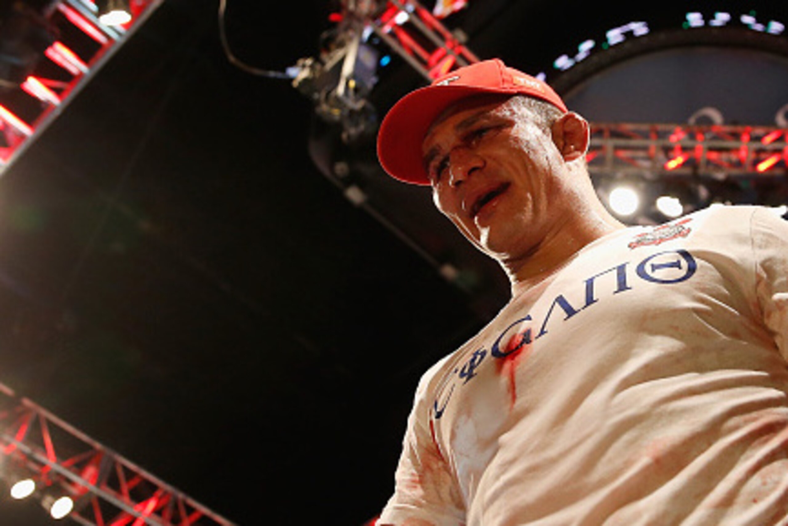 PHOENIX, AZ - DECEMBER 13: Junior dos Santos exits the octagon after defeating Stipe Miocic (not pictured) by unanimous decision in their heavyweight bout during the UFC Fight Night event at the at U.S. Airways Center on December 13, 2014 in Phoenix, Ari PHOENIX, AZ - DECEMBER 13: Junior dos Santos exits the octagon after defeating Stipe Miocic (not pictured) by unanimous decision in their heavyweight bout during the UFC Fight Night event at the at U.S. Airways Center on December 13, 2014 in Phoenix, Ari
