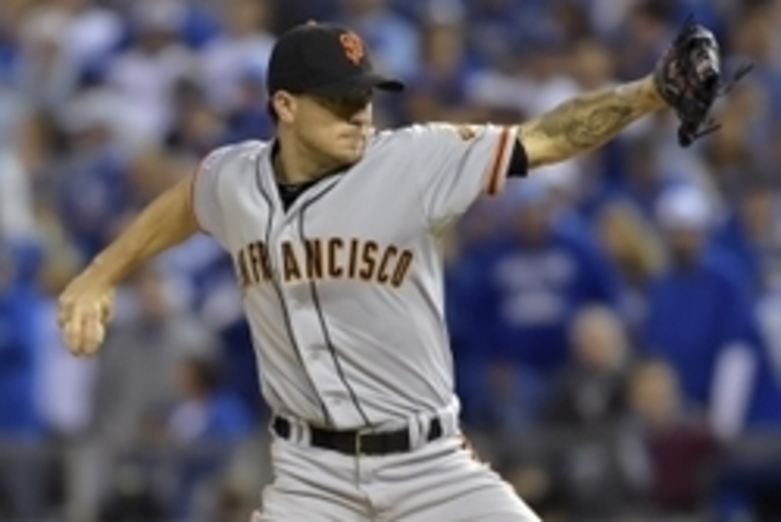 Oct 28, 2014; Kansas City, MO, USA; San Francisco Giants starting pitcher Jake Peavy throws a pitch against the Kansas City Royals in the first inning during game six of the 2014 World Series at Kauffman Stadium. Mandatory Credit: Denny Medley-USA TODAY S