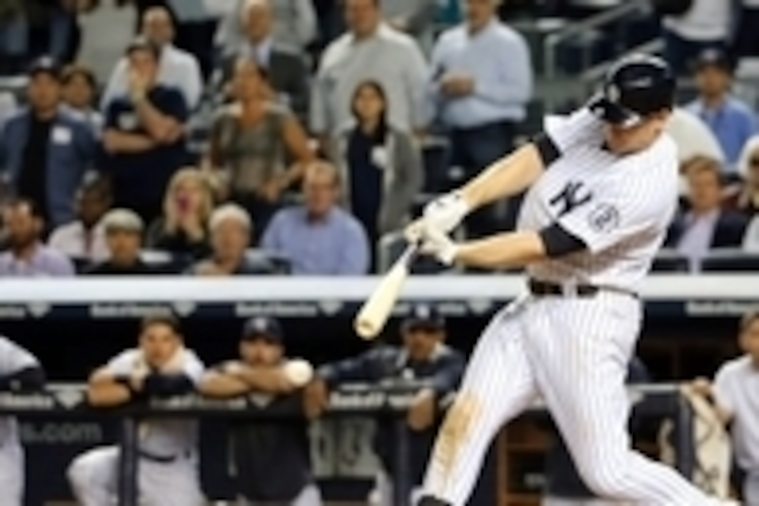 Sep 18, 2014; Bronx, NY, USA;  New York Yankees third baseman Chase Headley (12) will go safe to first on an error allowing a runner to score during the ninth inning against the Toronto Blue Jays at Yankee Stadium. New York Yankees won 3-2. Mandatory Cred
