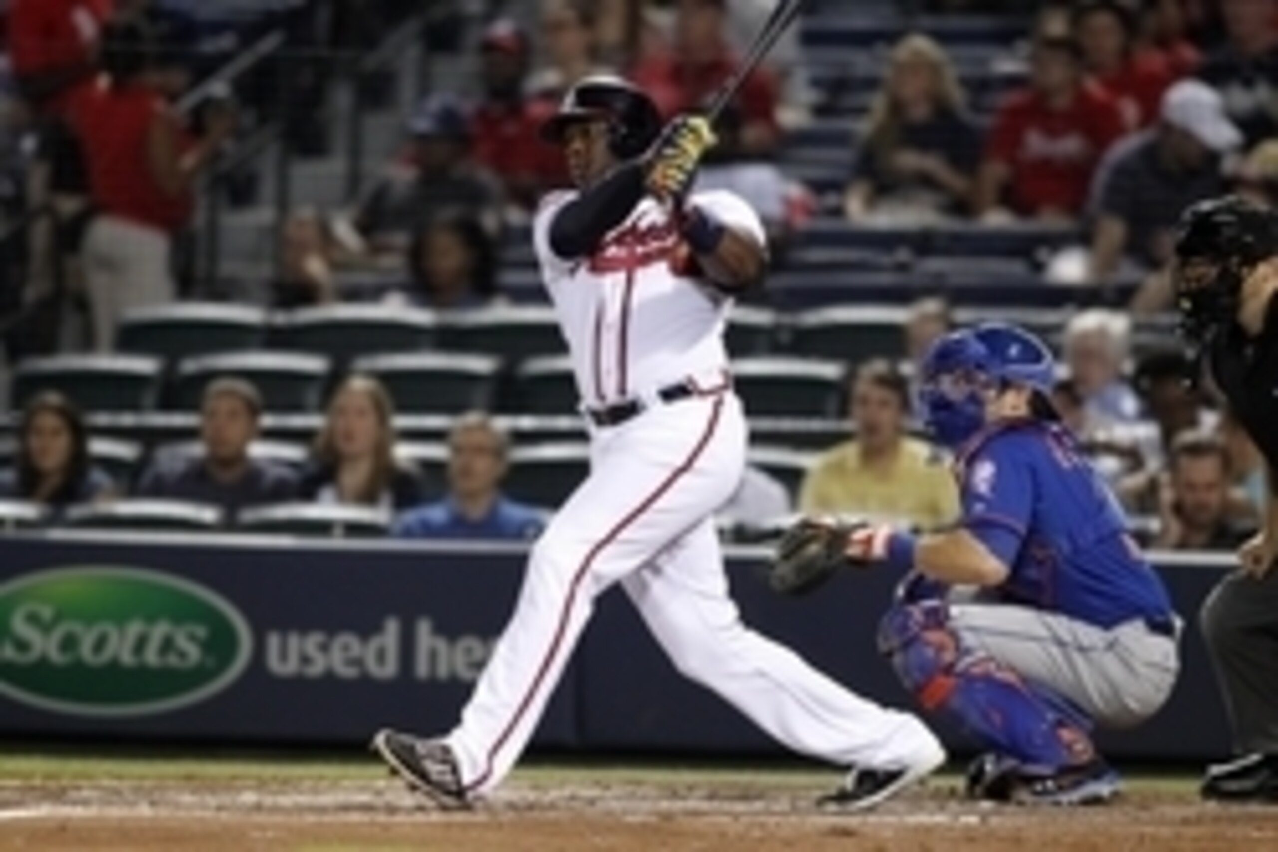 Sep 19, 2014; Atlanta, GA, USA; Atlanta Braves left fielder Justin Upton (8) hits a single against the New York Mets in the fourth inning at Turner Field. Mandatory Credit: Brett Davis-USA TODAY Sports
