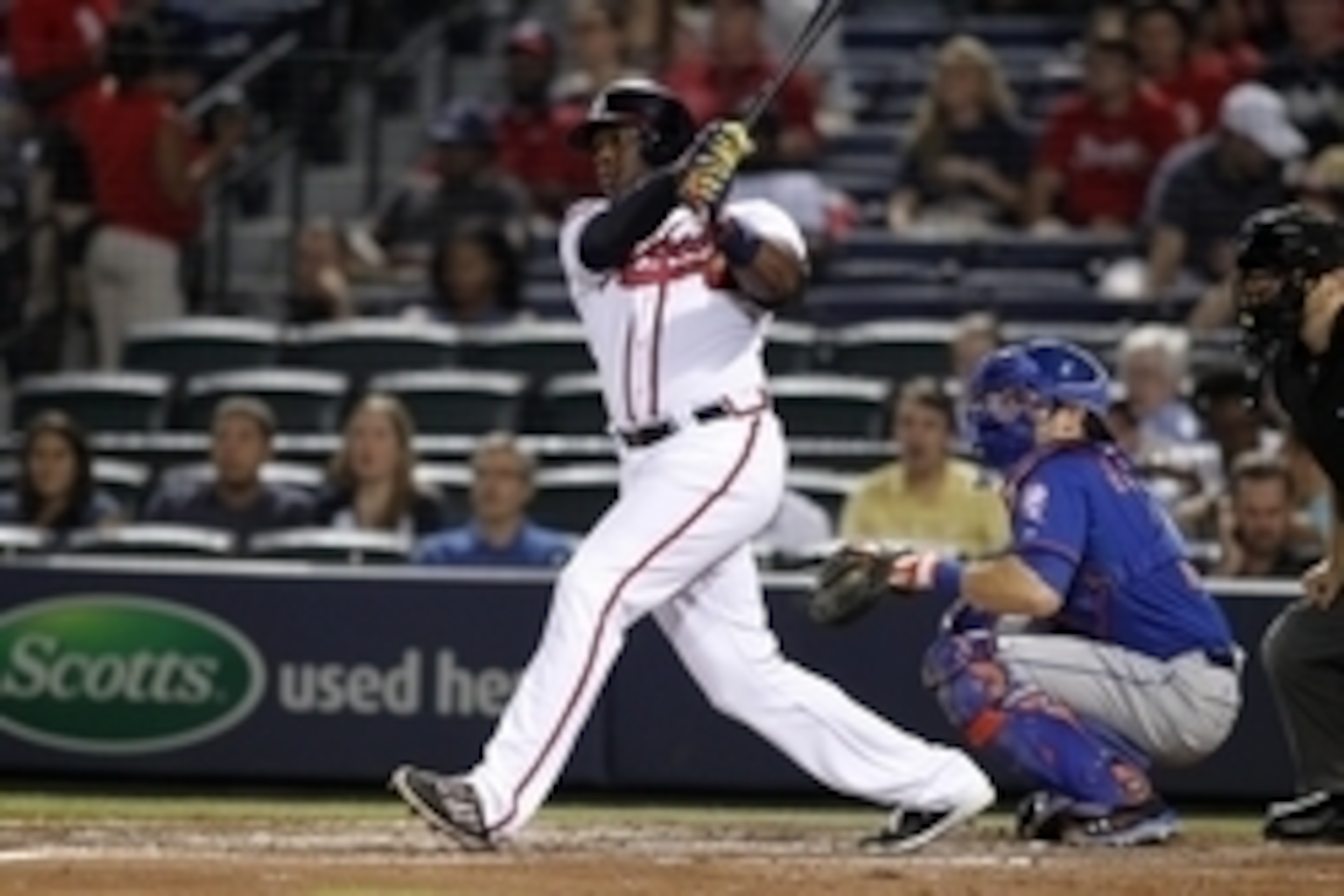 Sep 19, 2014; Atlanta, GA, USA; Atlanta Braves left fielder Justin Upton (8) hits a single against the New York Mets in the fourth inning at Turner Field. Mandatory Credit: Brett Davis-USA TODAY Sports