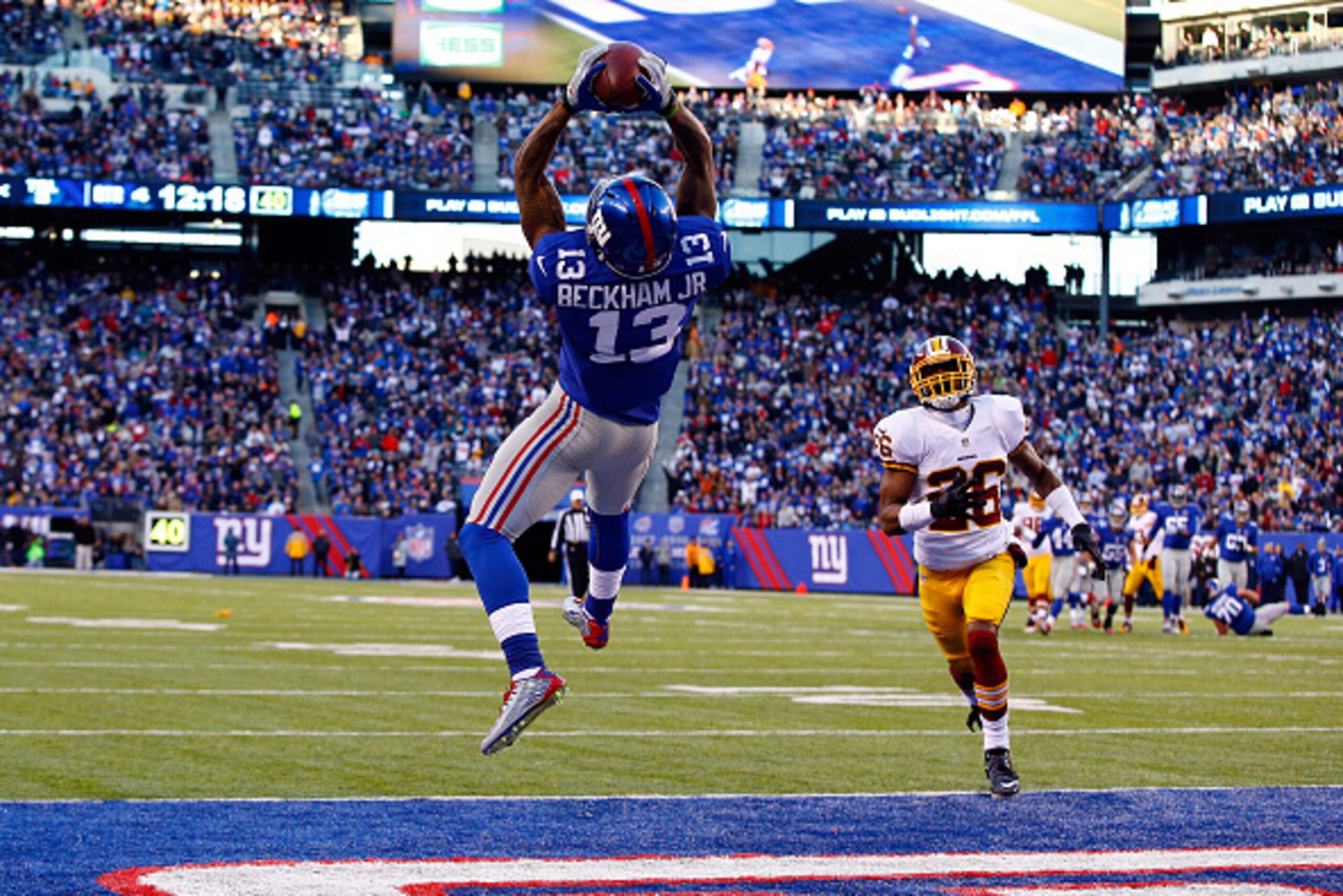 EAST RUTHERFORD, NJ - DECEMBER 14:  Odell Beckham Jr. #13 of the New York Giants attempts to score a 30 yard touchdown that was nullified due to a penalty in the fourth quarter during their game against the Washington Redskins at MetLife Stadium on Decemb