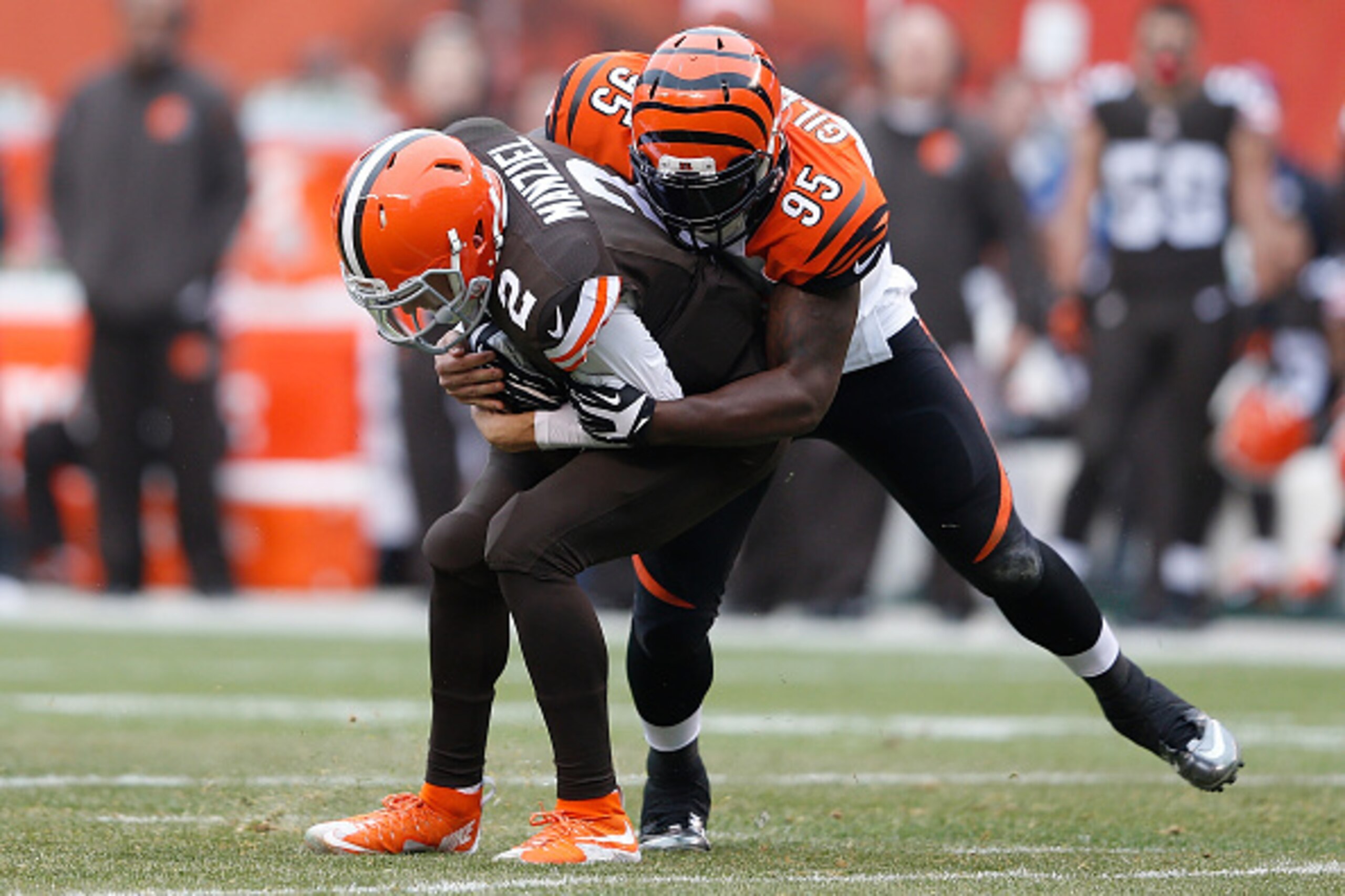 CLEVELAND, OH - DECEMBER 14: Wallace Gilberry #95 of the Cincinnati Bengals sacks Johnny Manziel #2 of the Cleveland Browns during the first quarter at FirstEnergy Stadium on December 14, 2014 in Cleveland, Ohio. (Photo by Joe Robbins/Getty Images) CLEVELAND, OH - DECEMBER 14: Wallace Gilberry #95 of the Cincinnati Bengals sacks Johnny Manziel #2 of the Cleveland Browns during the first quarter at FirstEnergy Stadium on December 14, 2014 in Cleveland, Ohio. (Photo by Joe Robbins/Getty Images)